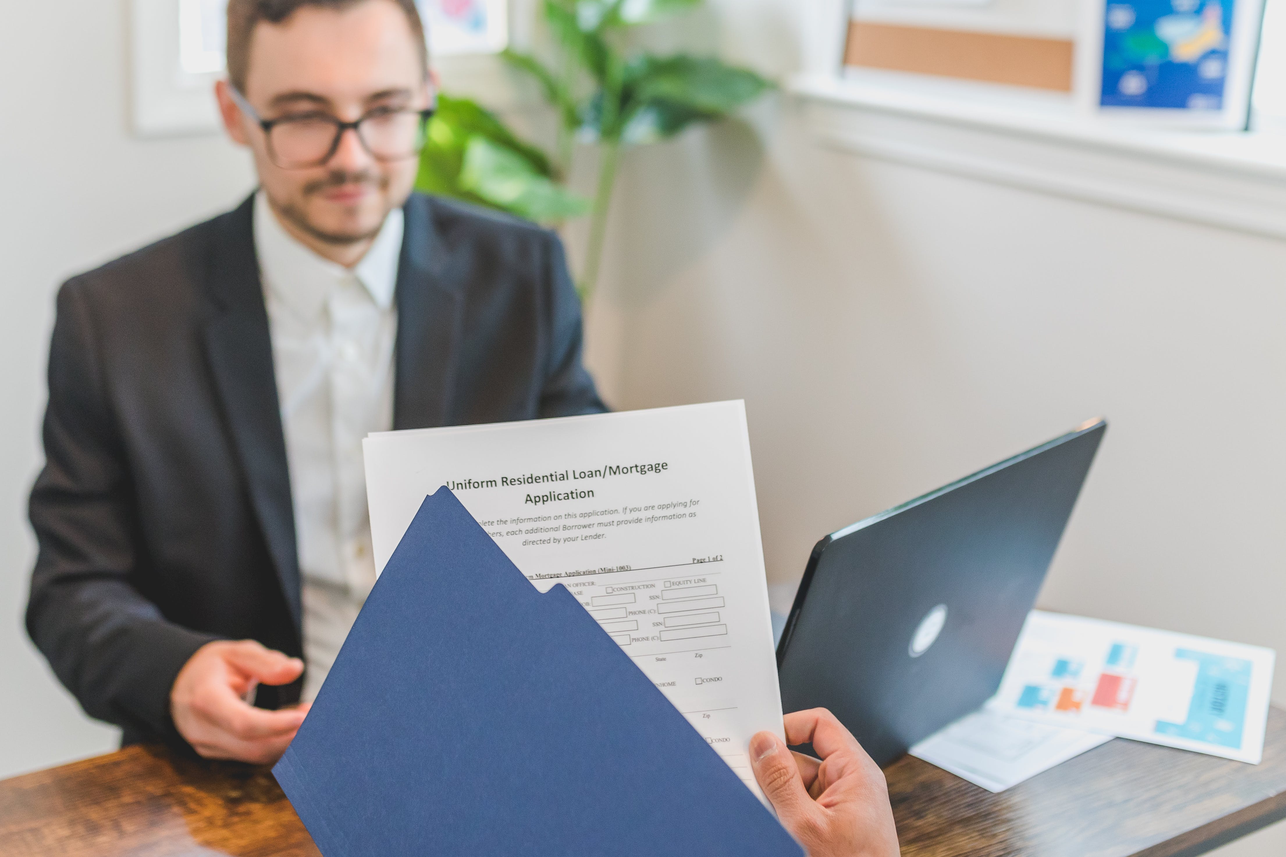 Person holding a loan document