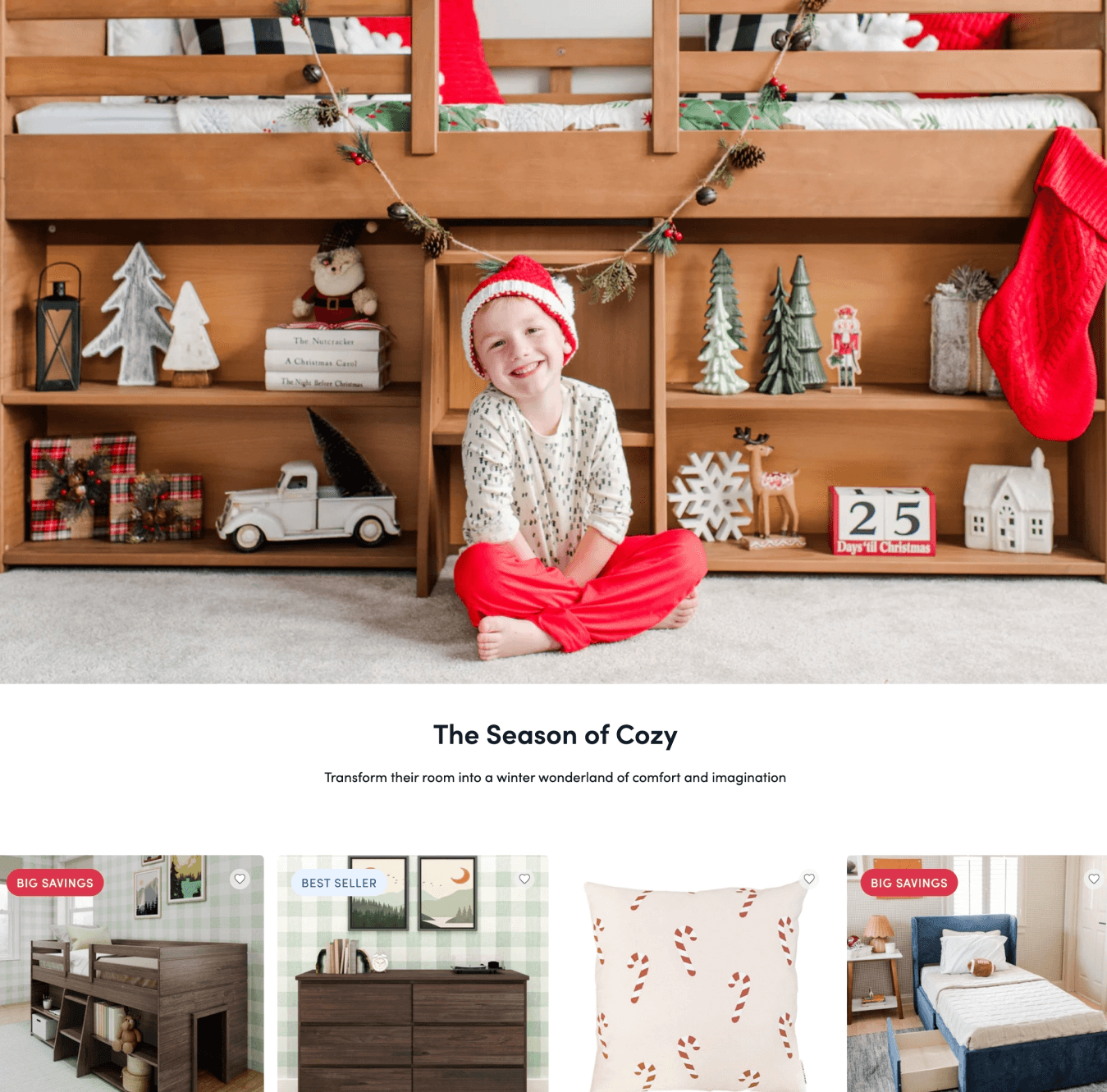 A webpage hero featuring a child wearing holiday themed clothing sitting in front of a wooden bed with storage shelves under it. Lining the shelves are various holiday decorations such as trees, gift boxes, a toy truck, and a wooden block calendar.