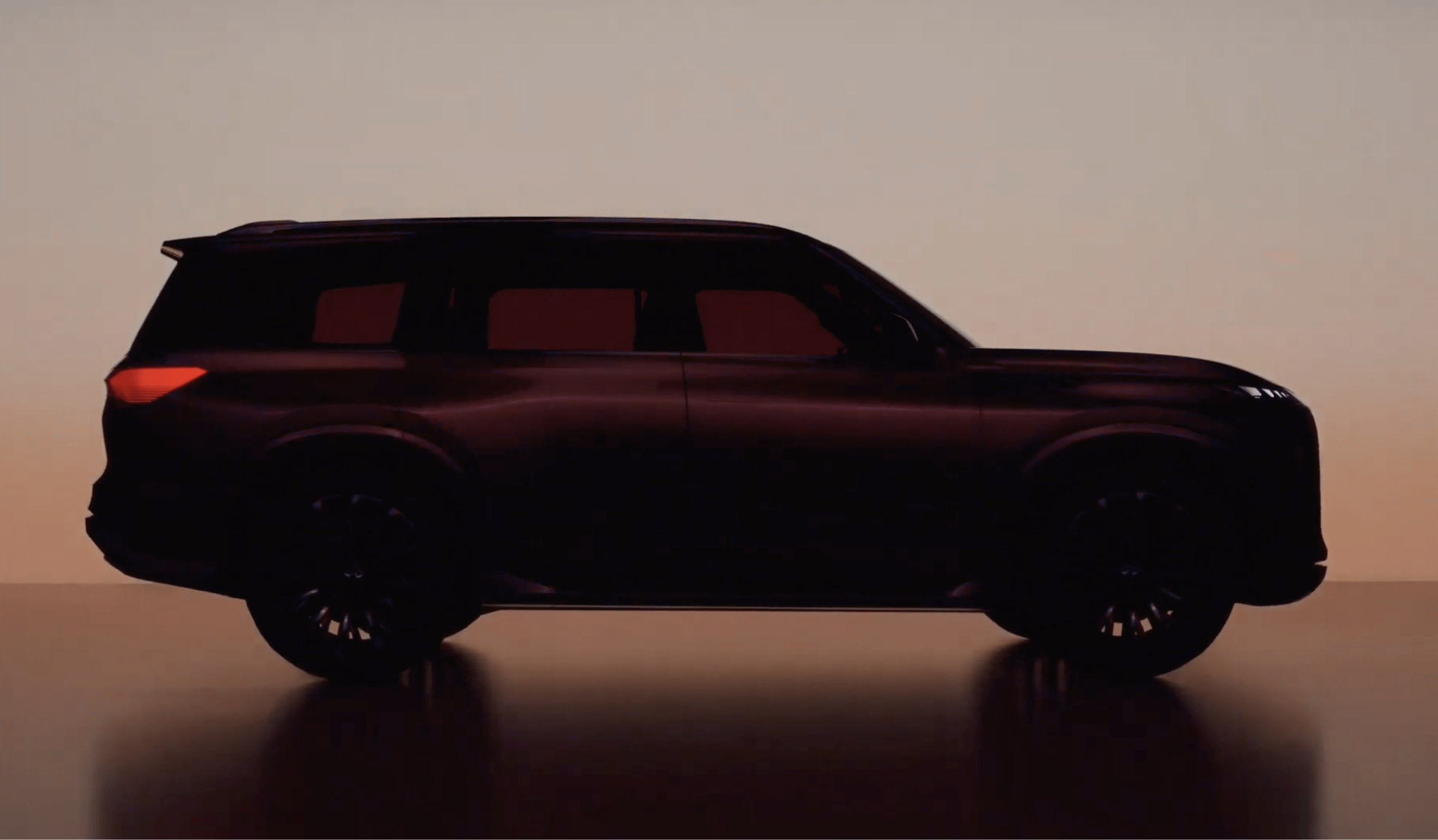 Silhouette of a luxury SUV with sleek design and modern LED headlights, set against a soft gradient background, showcasing the refined and robust profile of the vehicle.