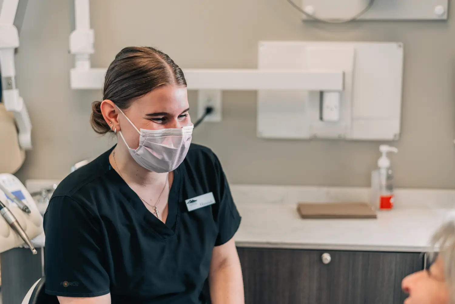 Summit View Dental Centre team photography featuring people inside a professional space design detail
