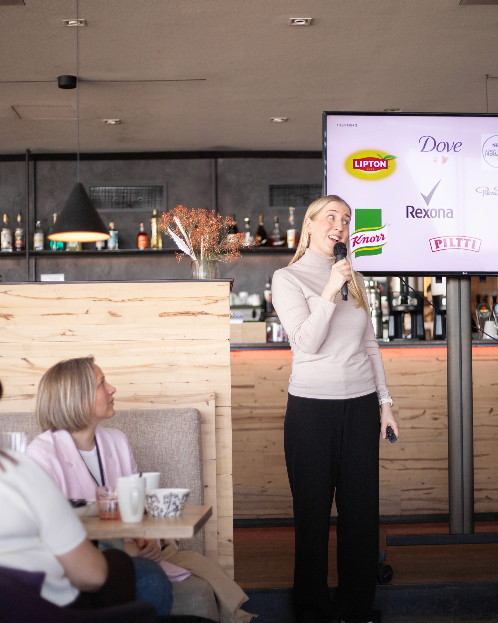 Nea Mertsalmi on stage sharing the Finlayson brand story