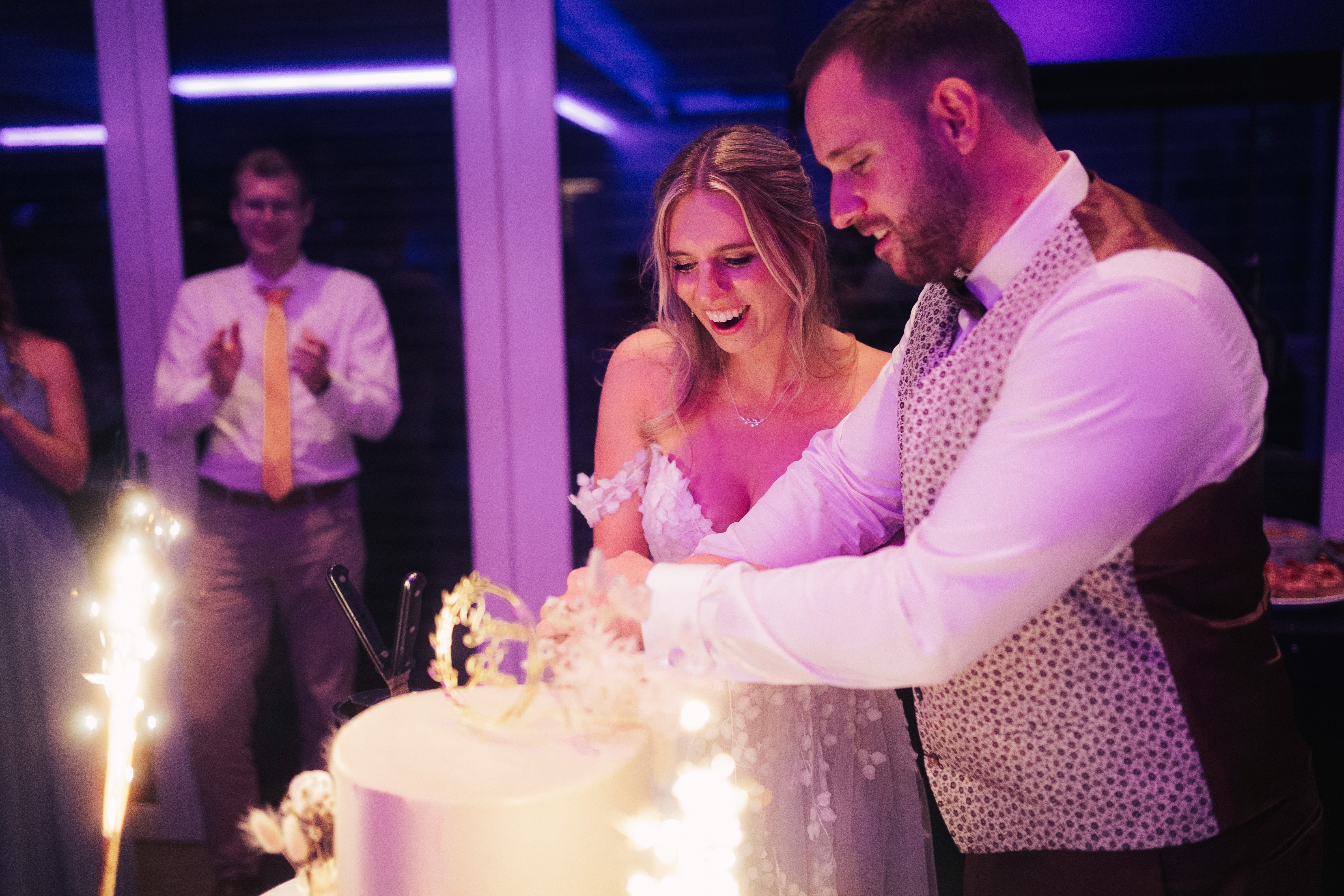 Small wooden chapel surrounded by tall trees