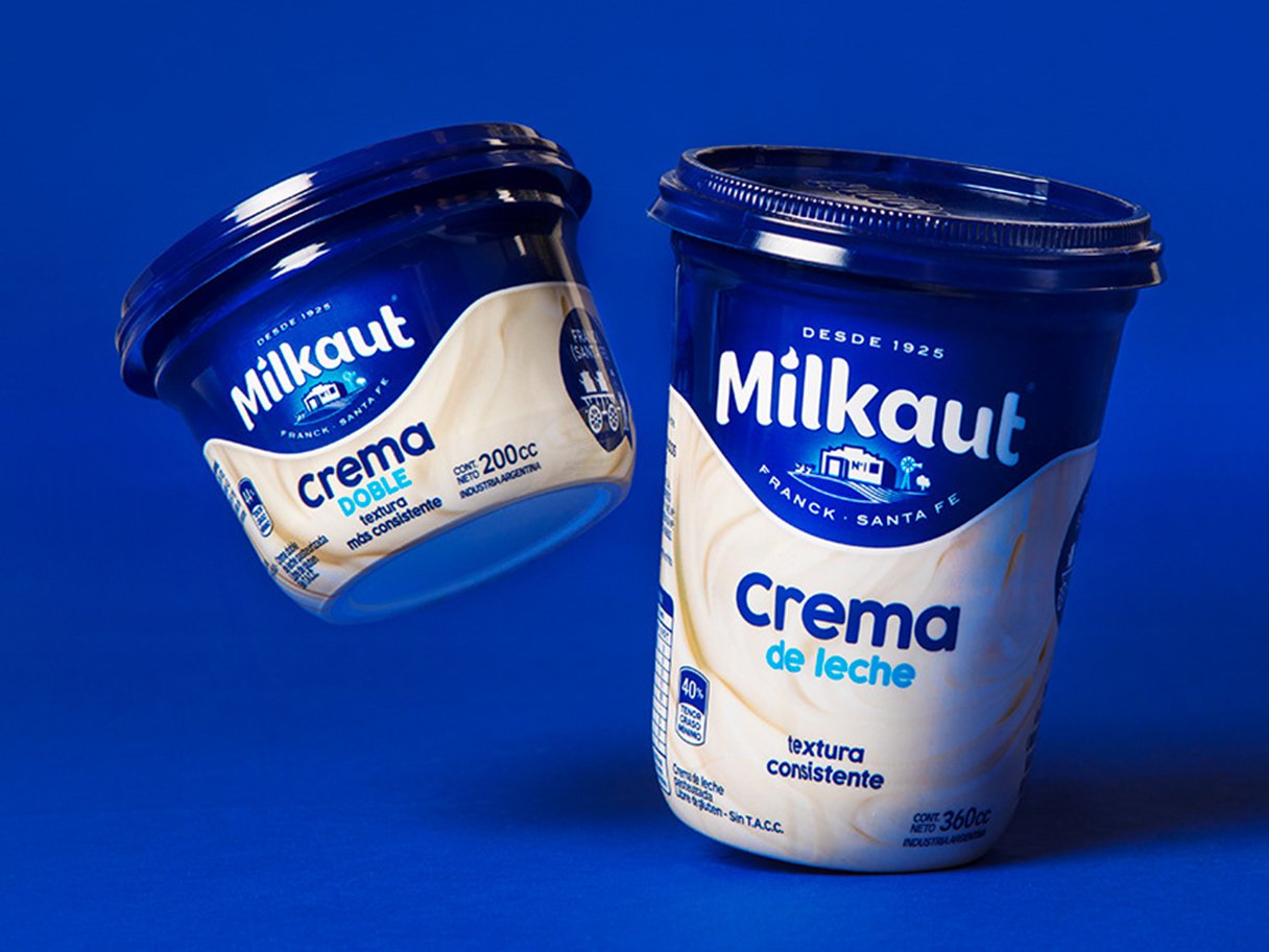 Rooftops of a coastal town with the sea in background