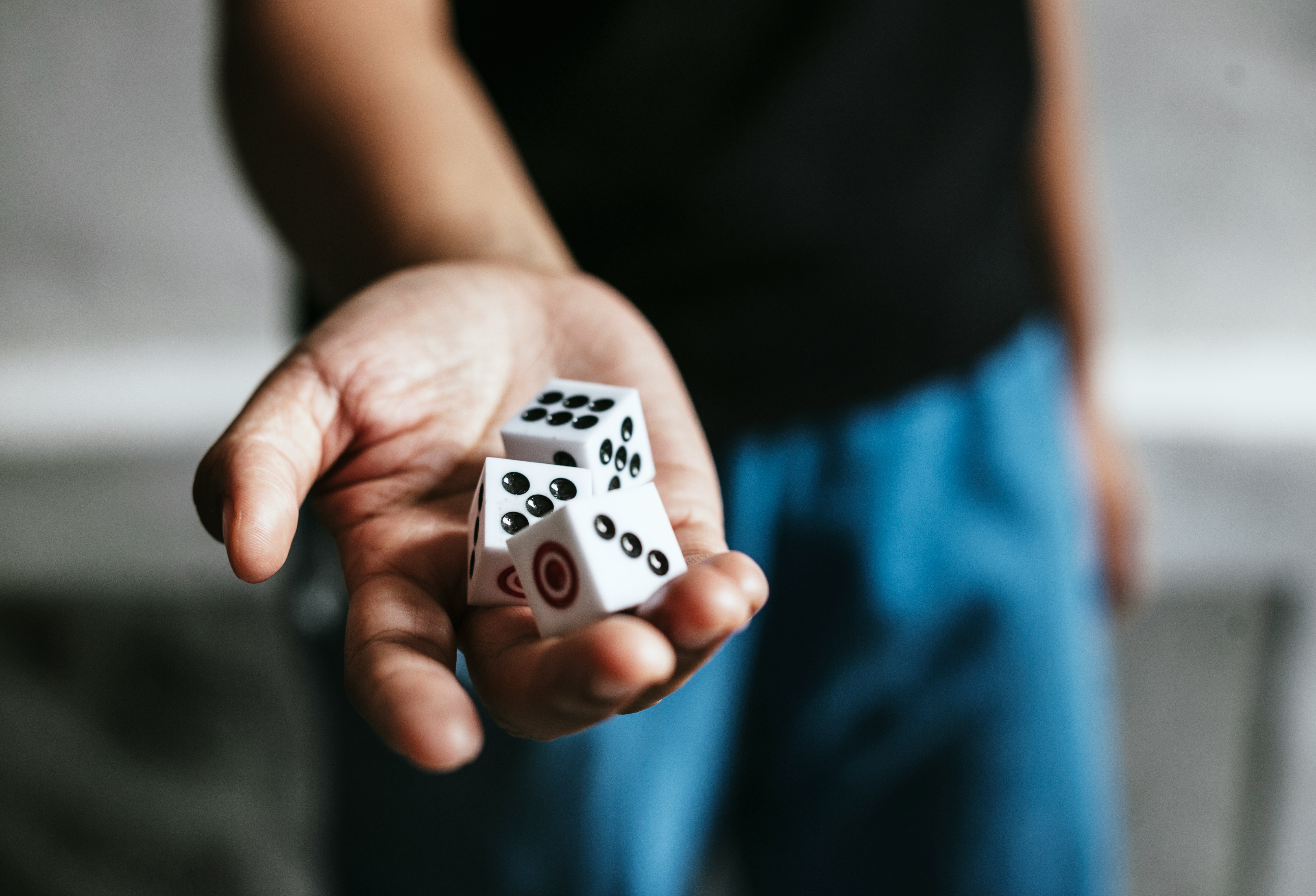 Person Holding Dice
