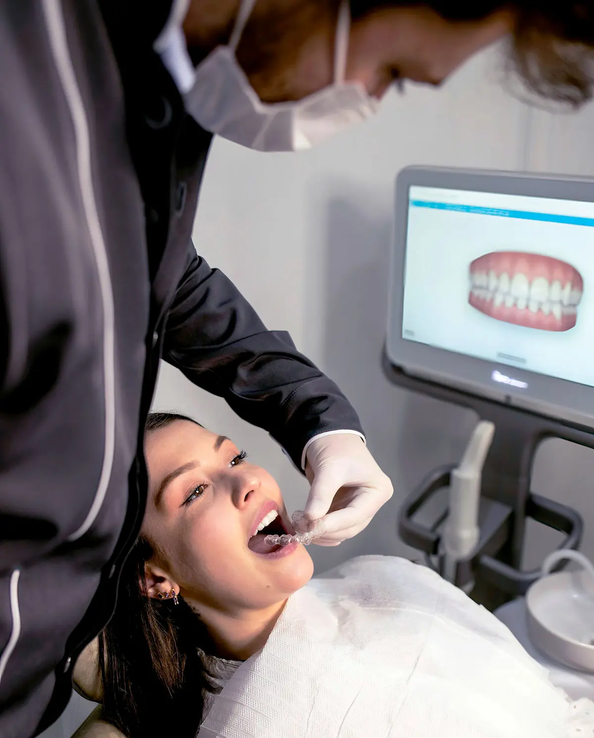 female Patient getting check by Dentist.