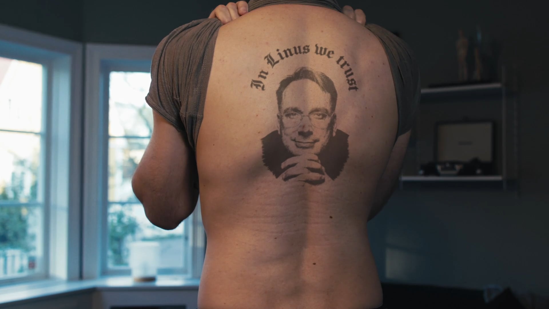 a persons back with a big tattoo