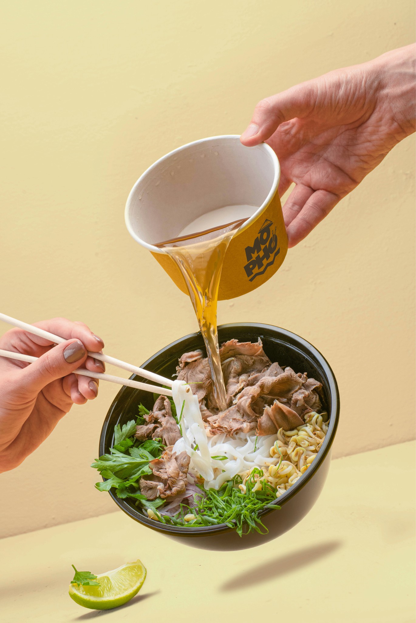 Takeaway packaging design for Mopho Vietnamese Noodle Bar, showcasing clean branding and custom illustrations