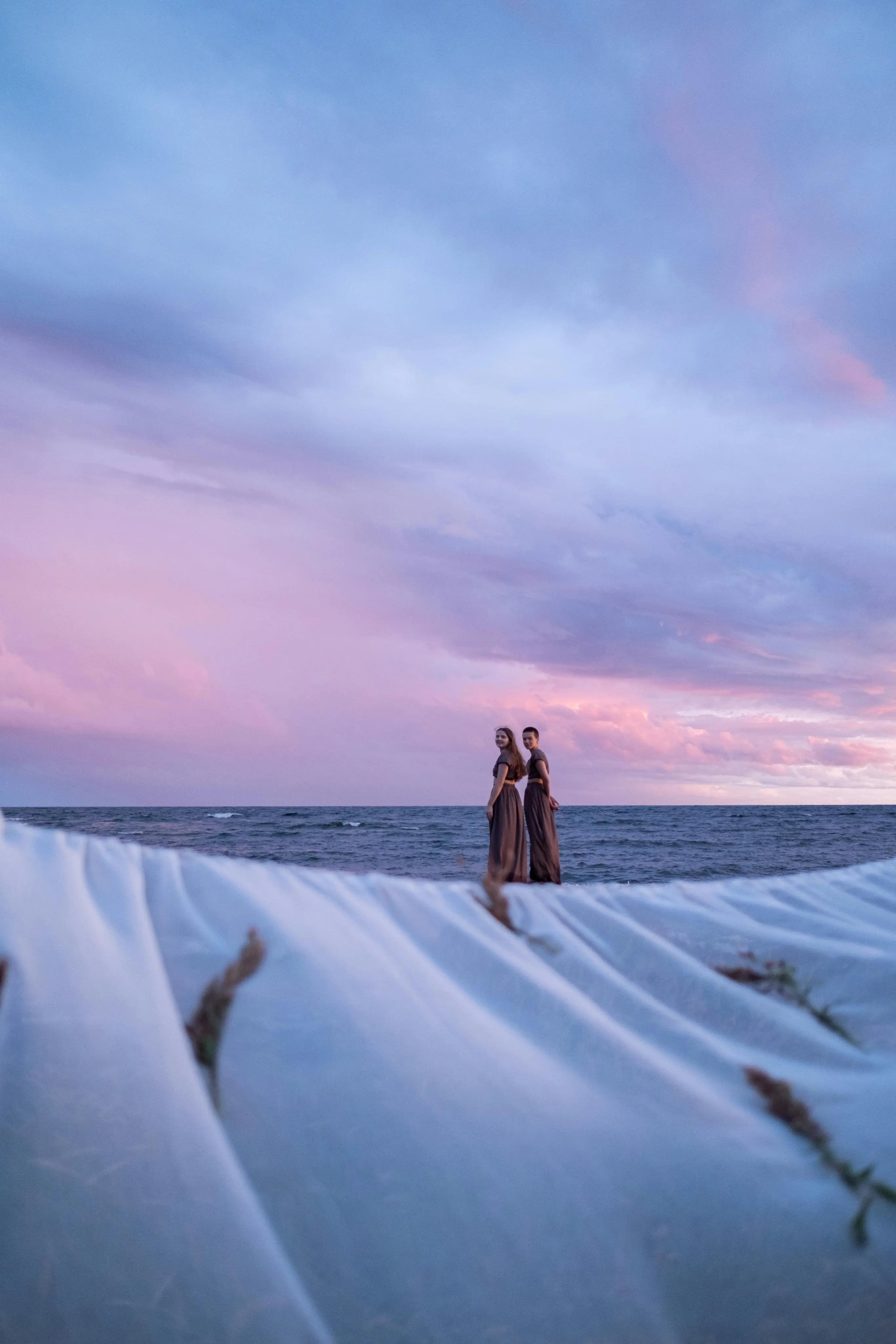 Emma Rivera & Lily Martinez are posing in the seaside