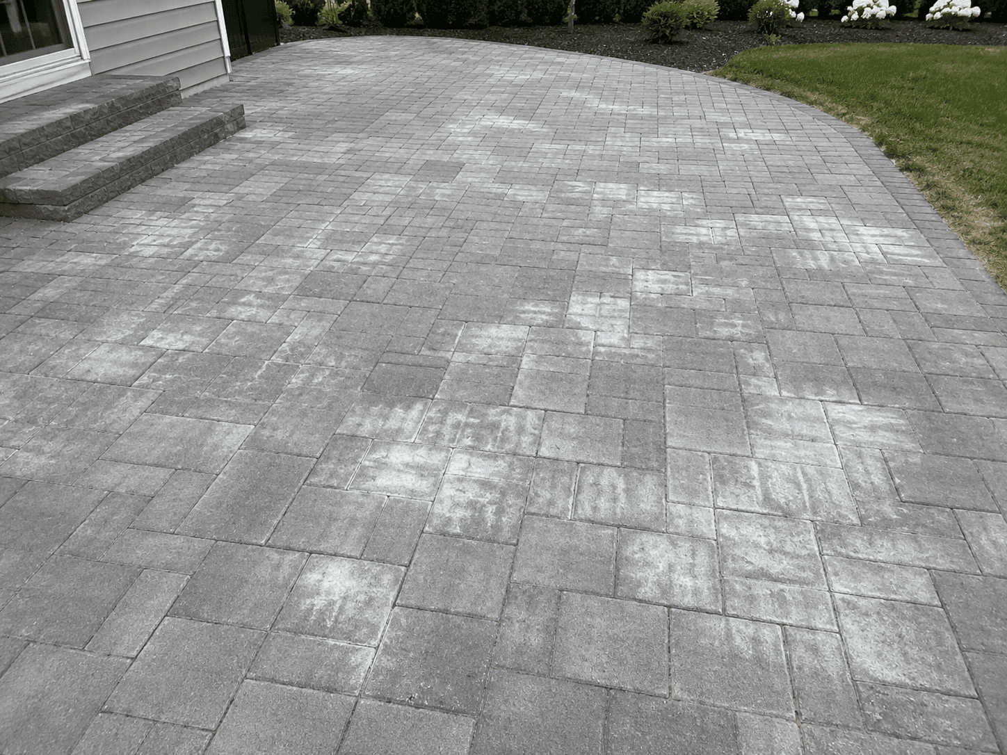 Pavers with white discoloration before diagnosis and repair
