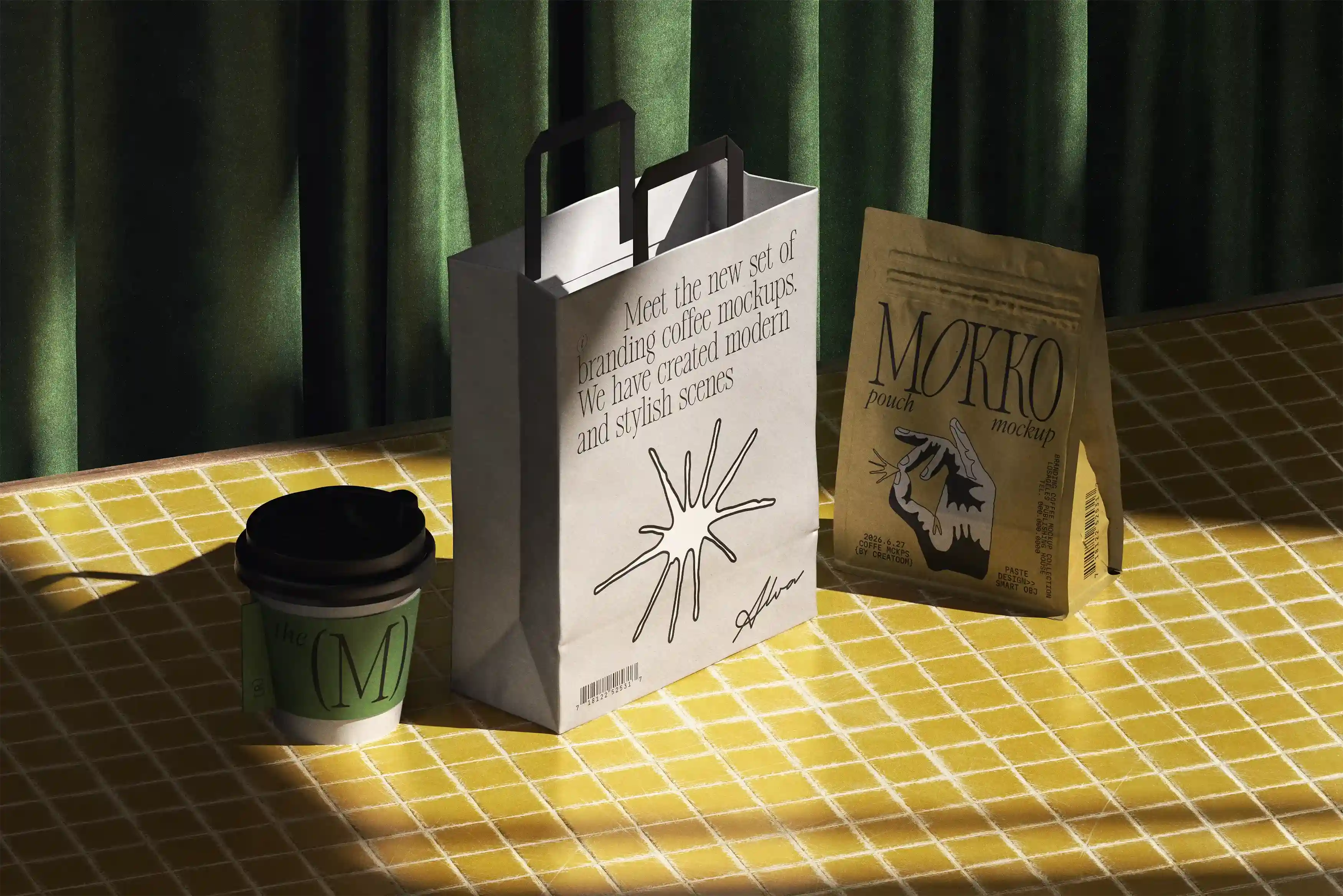Branded takeaway coffee cup, paper bag, and pouch on yellow tiled table under natural light