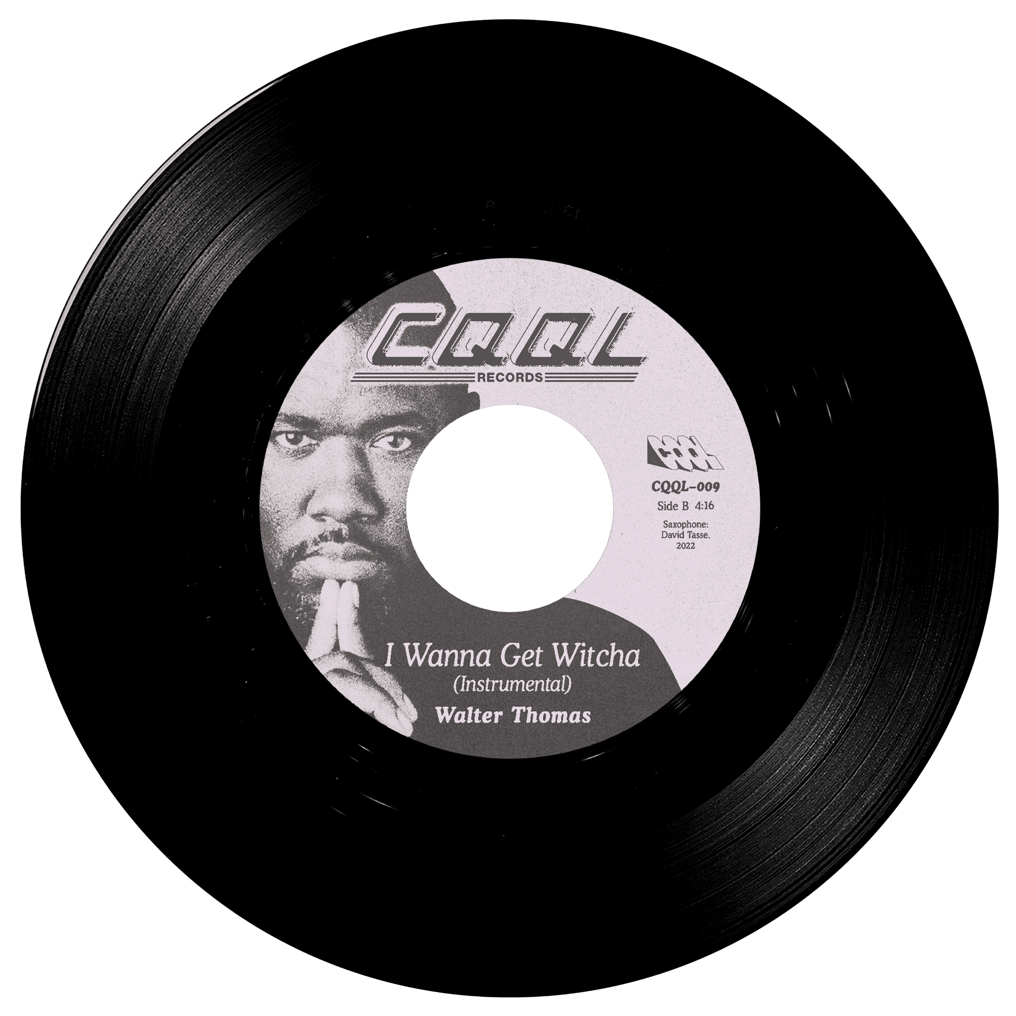 Black vinyl record with a white label featuring a person's face and text.