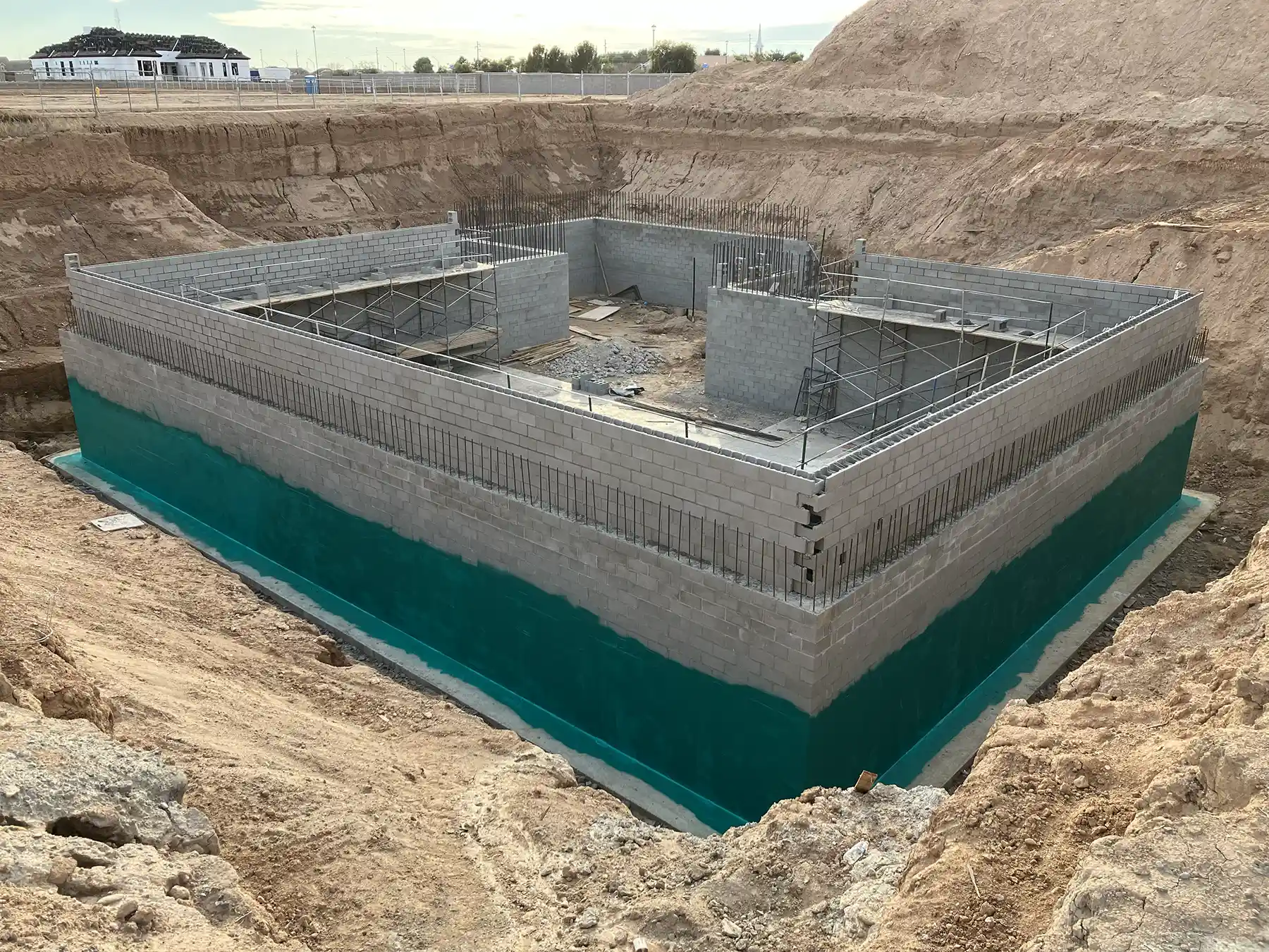 A foundation covered in waterproofing