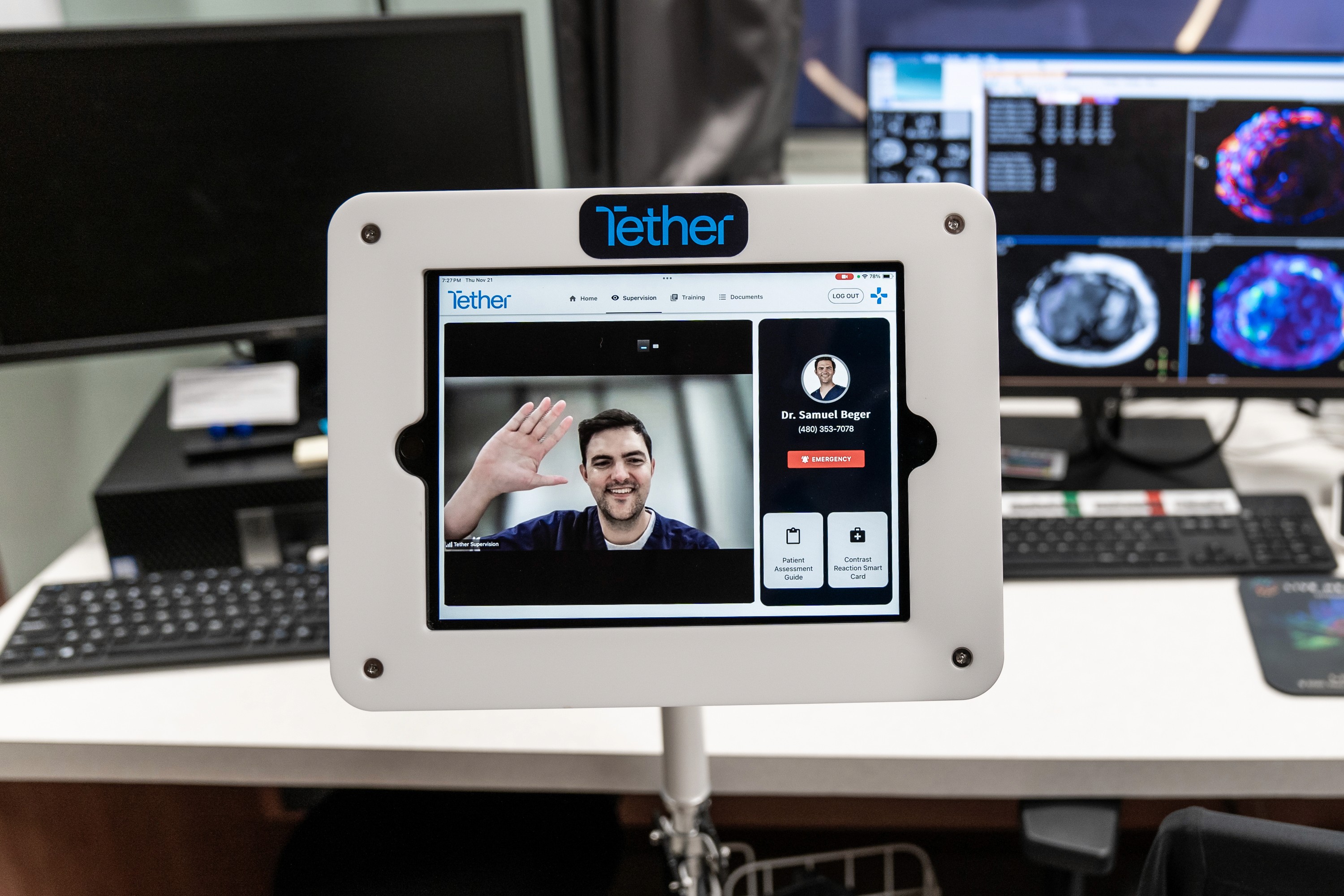 Tether Supervision mobile contrast unit displaying a live virtual radiologist on a secure, HIPAA-compliant video interface used for real-time direct supervision of contrast-enhanced CT and MRI.