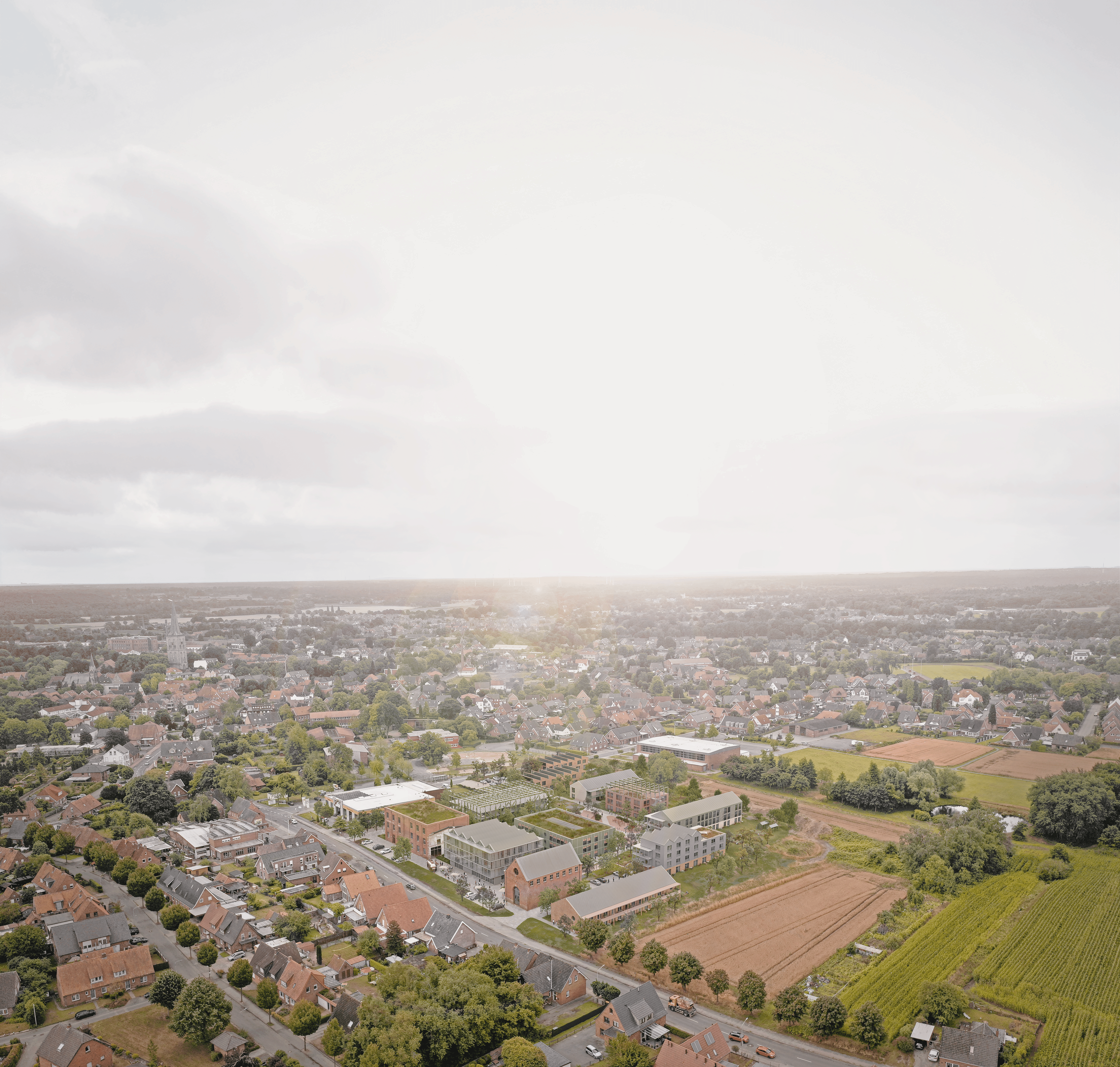 Isometrische Zeichnung eines Bauprojekts mit mehreren Gebäuden und markierten Strukturen in Rot