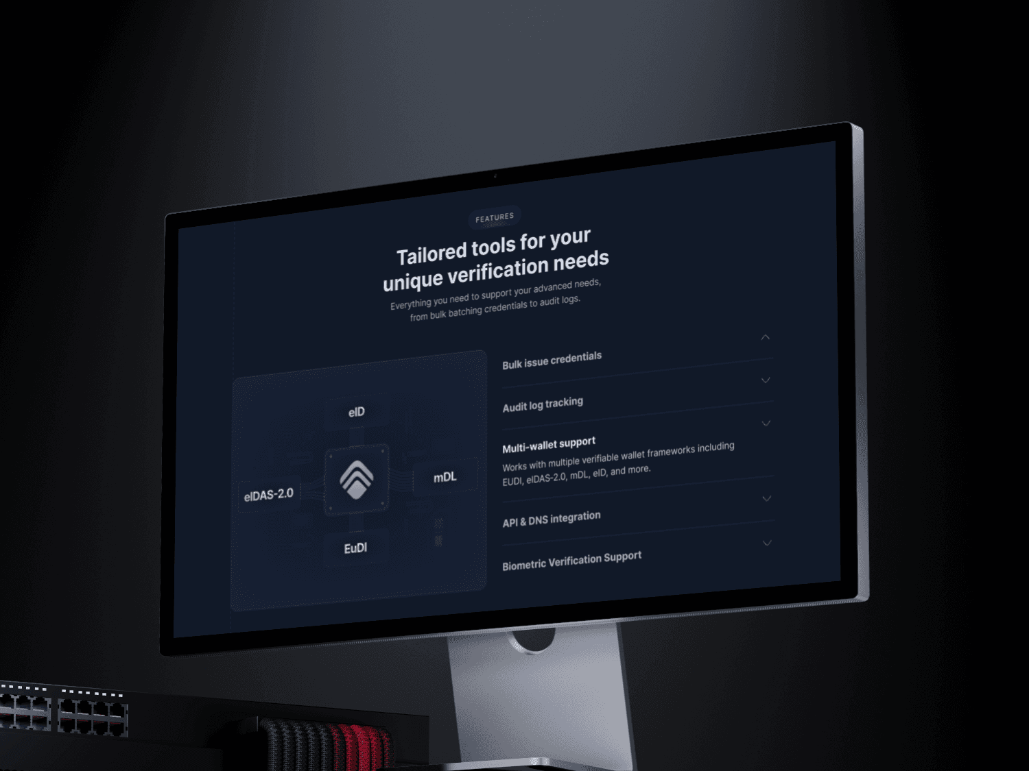 White branded cap with turquoise logo placed on fresh lemons in a red bowl