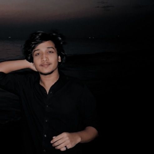 a man with a dark background