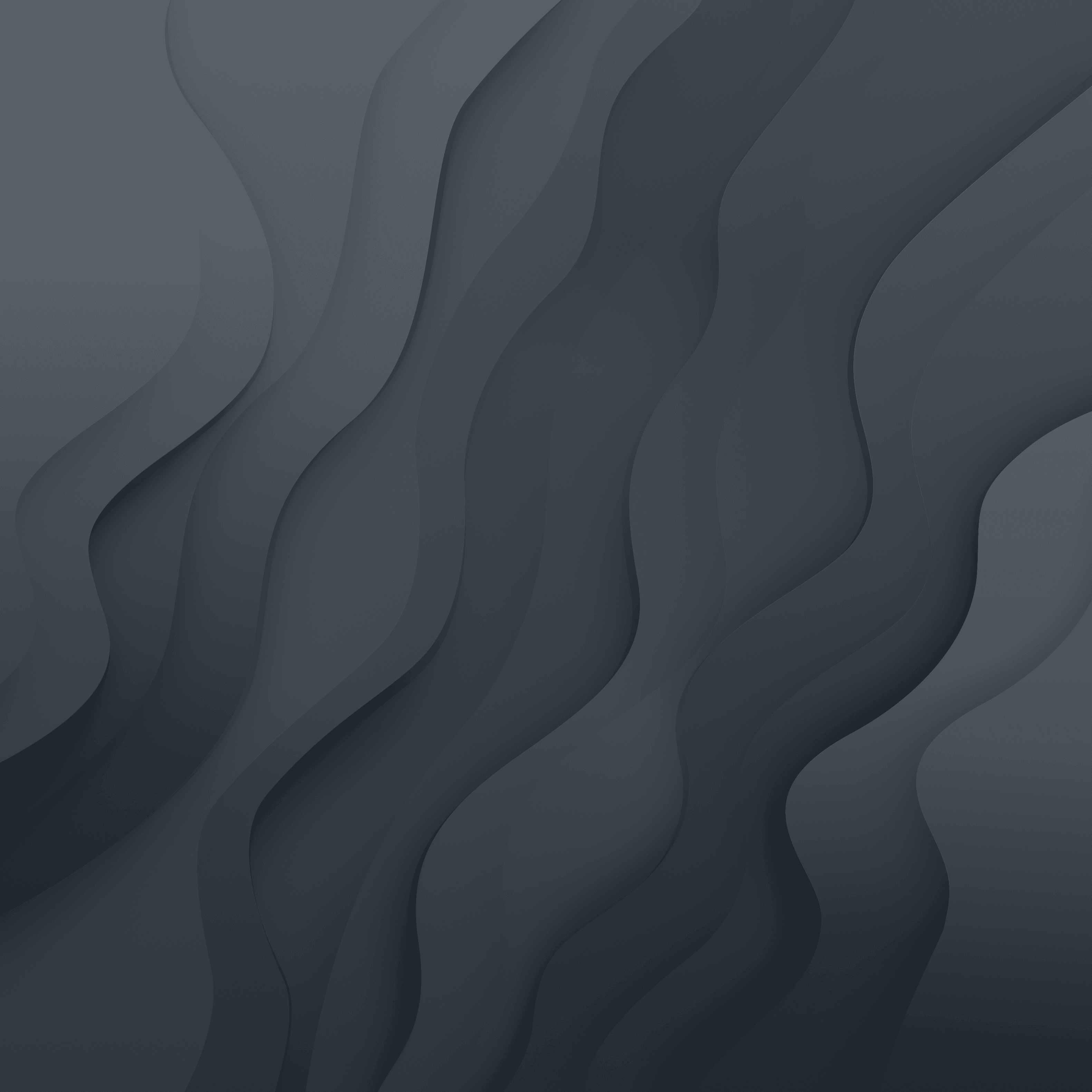 two people in a workspace working on their laptops 