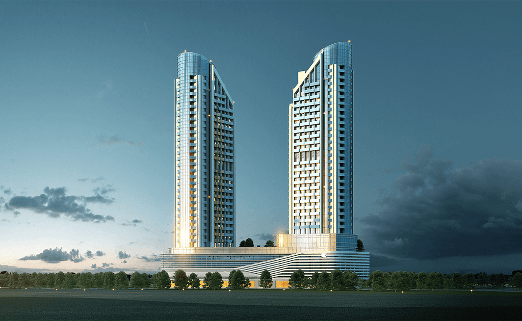 Two tall buildings against a cloudy sky, showcasing the Cloud Tower in Dubai.