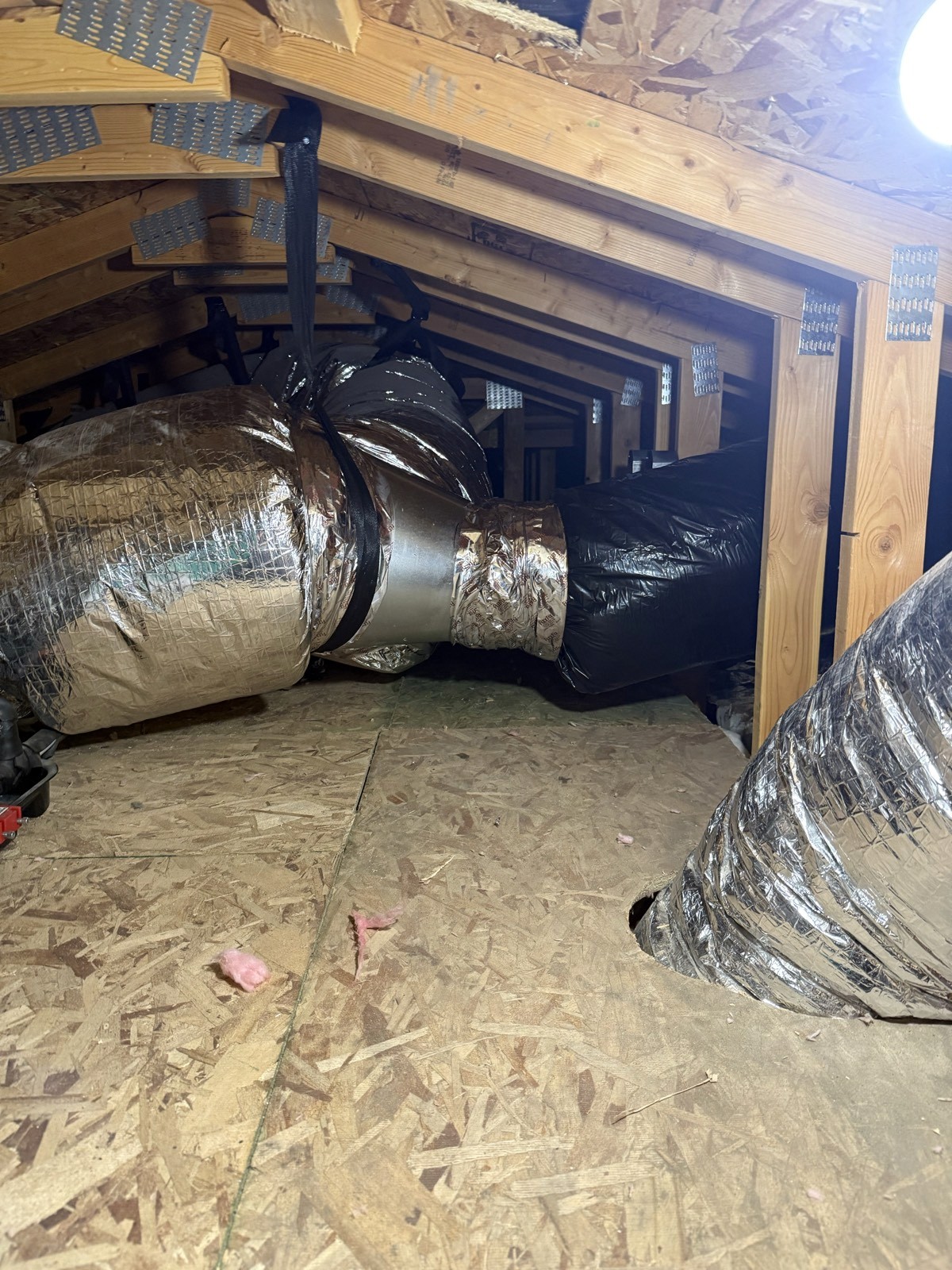 New supply duct split into two runs through a wye in a Boise attic