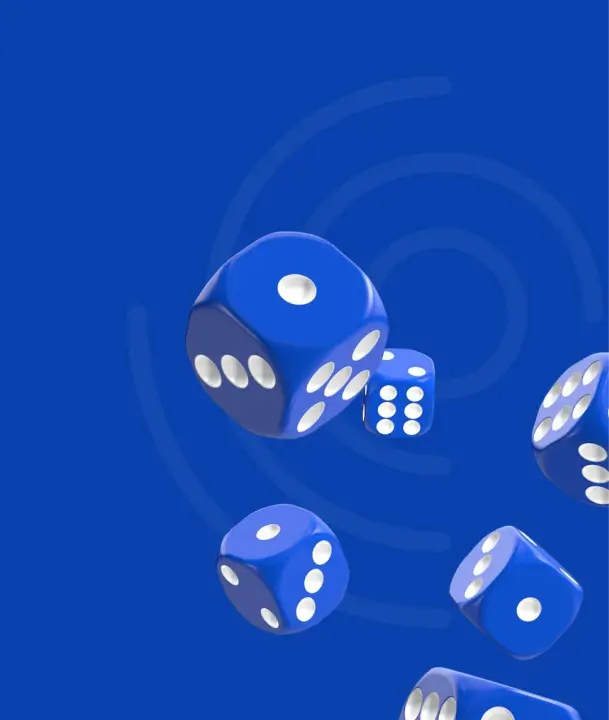Blue rolling dice in air