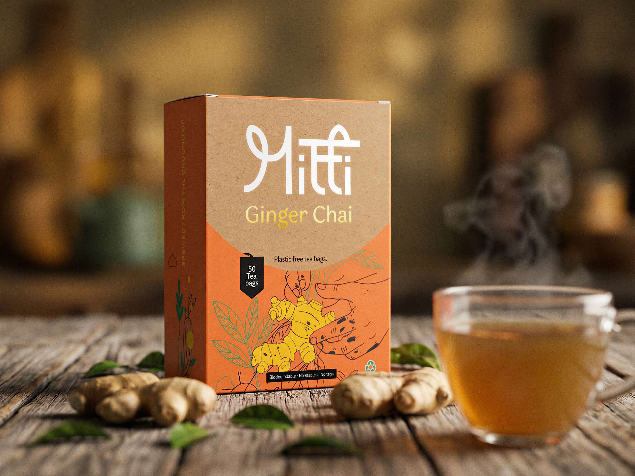 Orange and gray knitted beanie floating over a soft blue background.