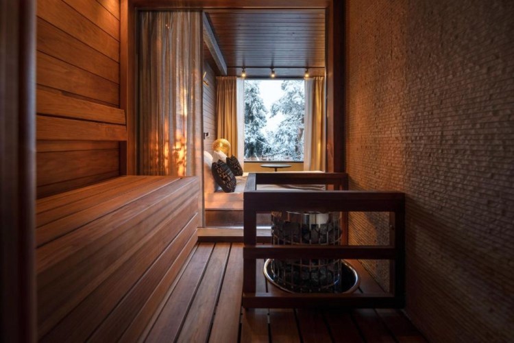 sunloungers fronting buildings near mountain