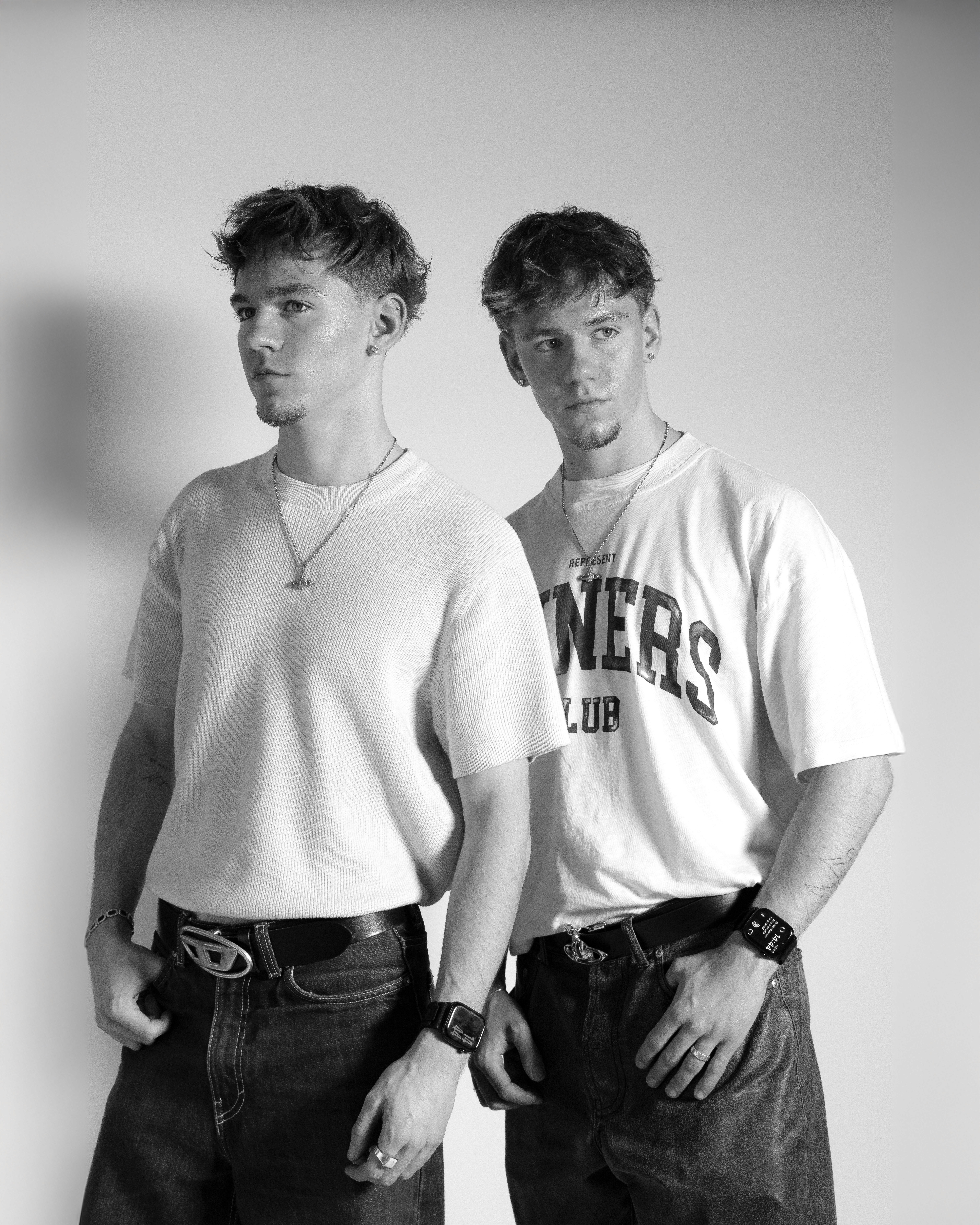 Ollie and Theo Batkin, twin co-founders of Batkin Studio, black and white studio portrait.