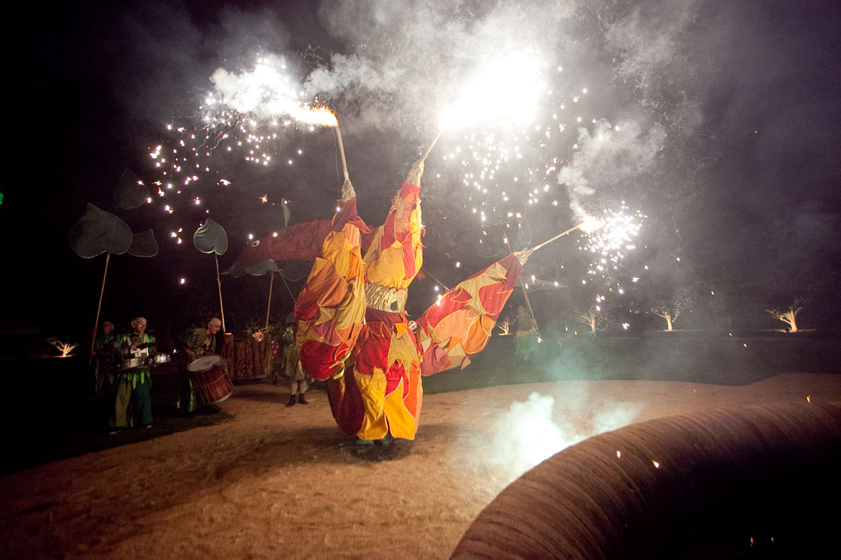 Team members in an office setting having a discussion, representing clear communication throughout the project process.