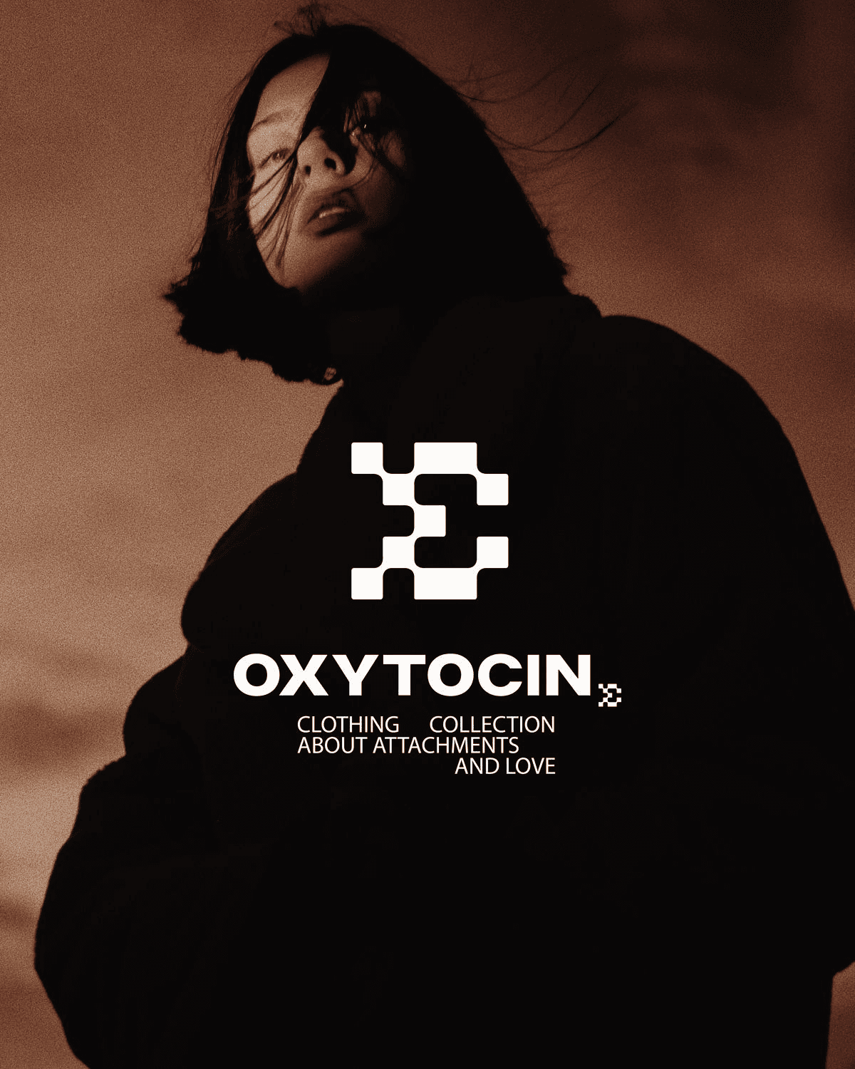 man wearing grey t-shirt standing in front of man sitting on chair