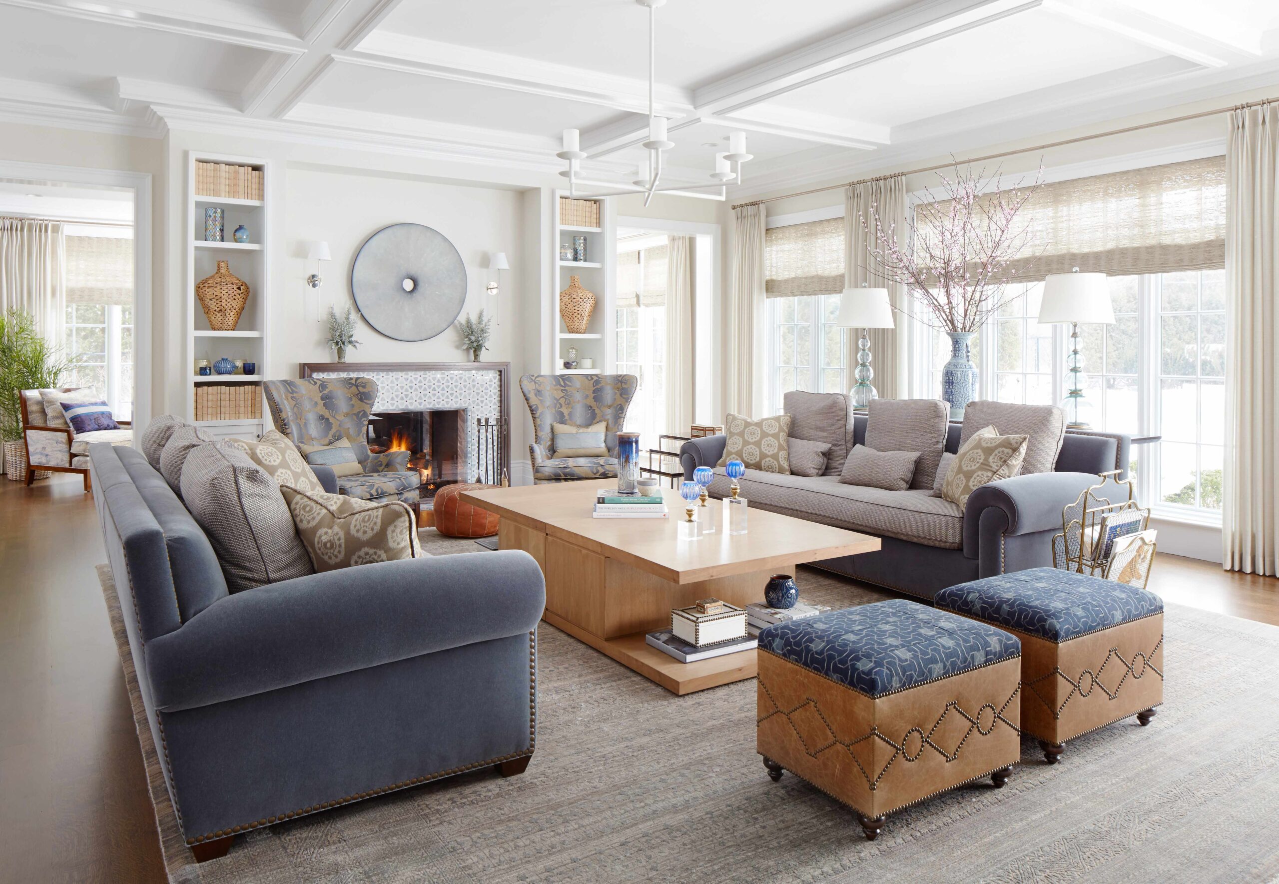 Timeless luxury living room with natural materials, custom millwork and layered lighting