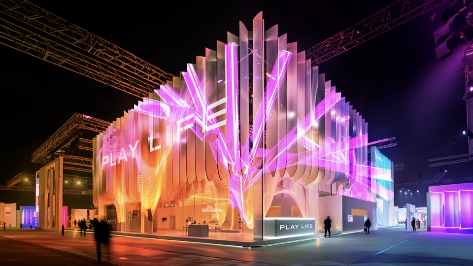 A vibrant architectural structure at night is illuminated with colorful, neon lights showcasing dynamic patterns, featuring the words "Play Life" with silhouetted figures walking nearby, against a backdrop of digital art and contemporary design.