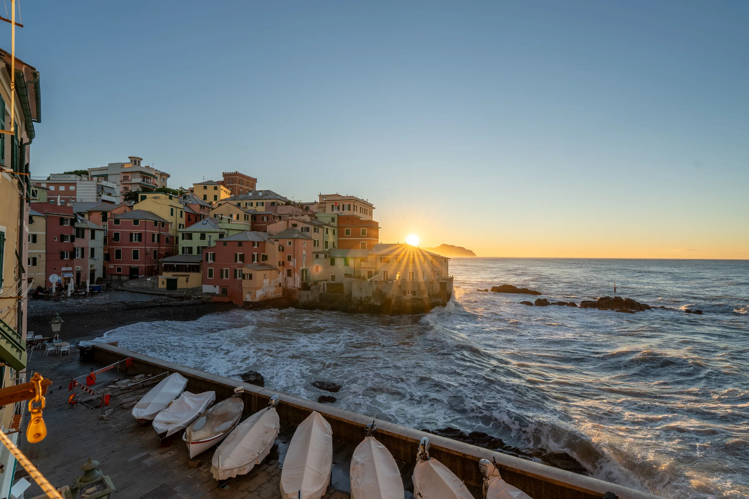 Boccadasse harbour at sunset — Boccadasse, Genoa, Italy. Photography by Yunes Calore.