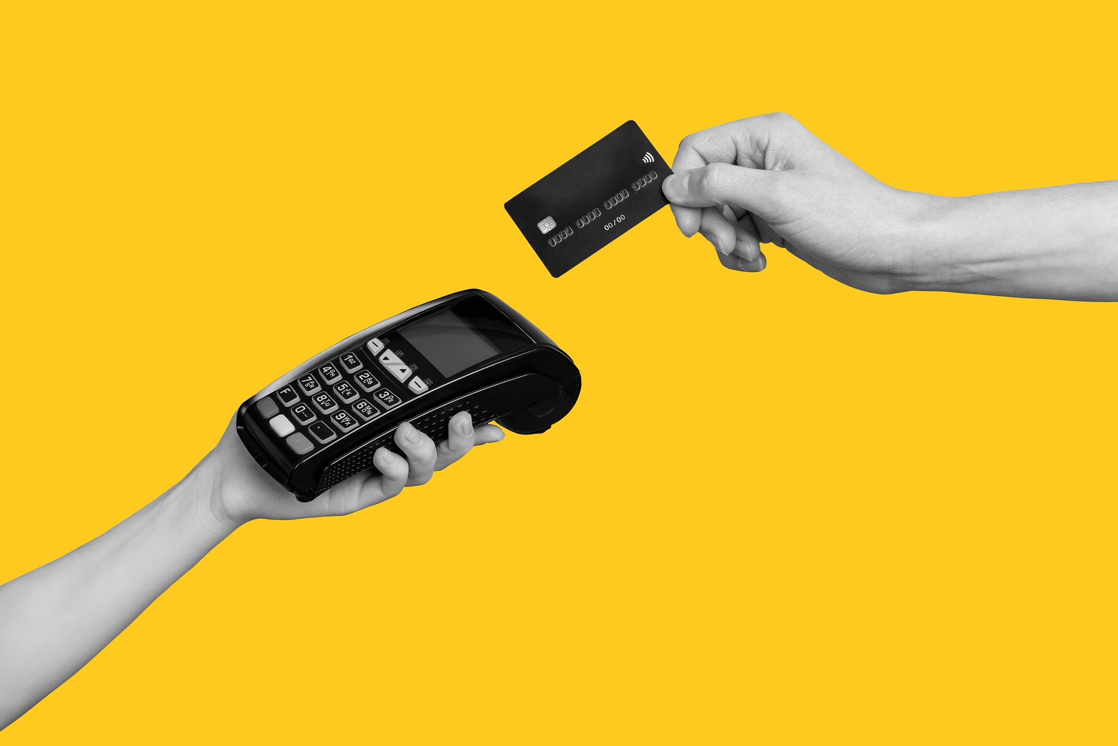 Photo of someone about to tap a credit card on a handheld terminal