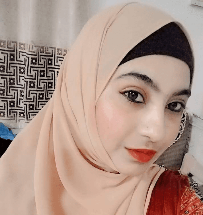 Close-up of vibrant purple flowers with droplets of water, creating a rich, textured background.