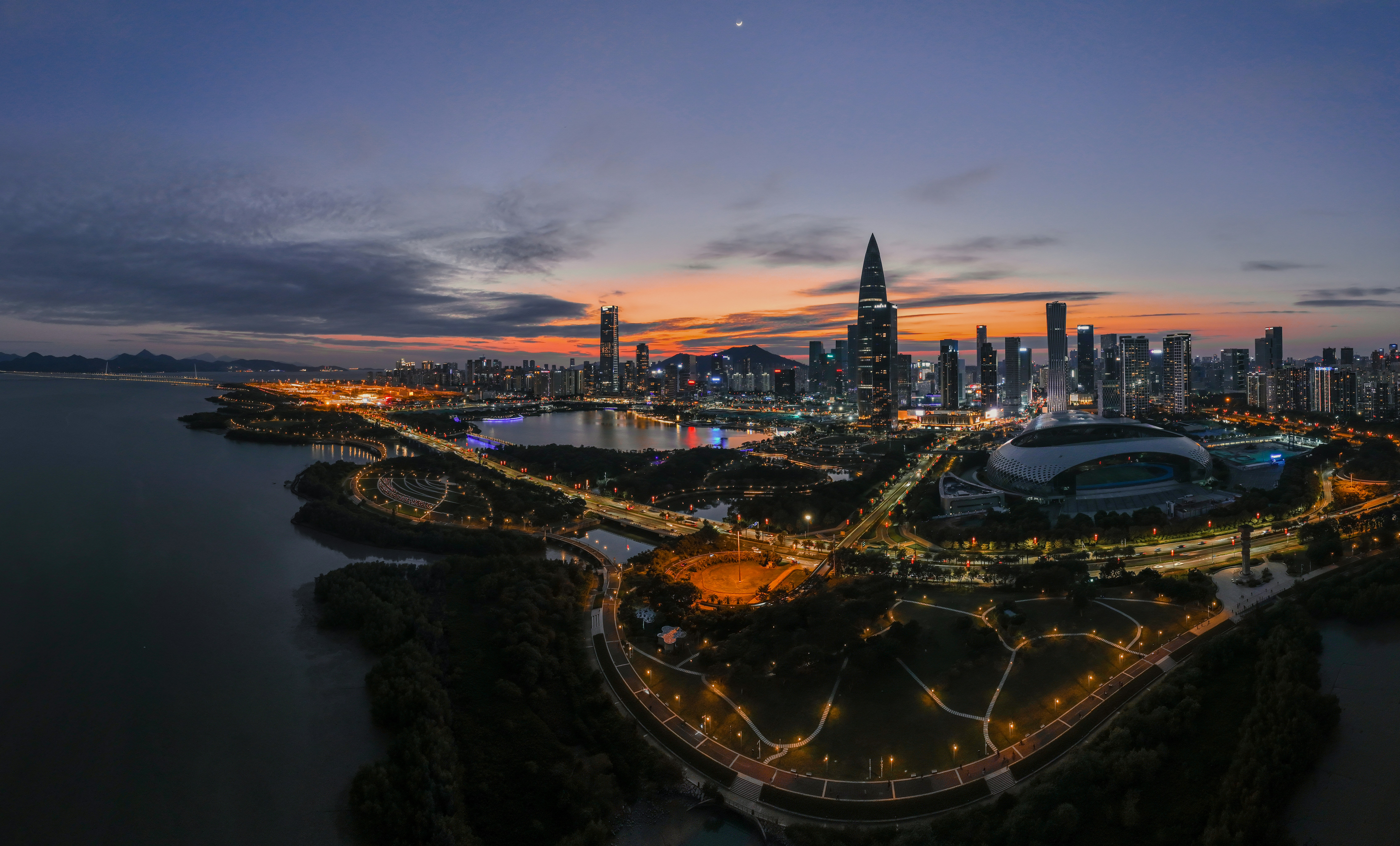 an aerial view of a city at night