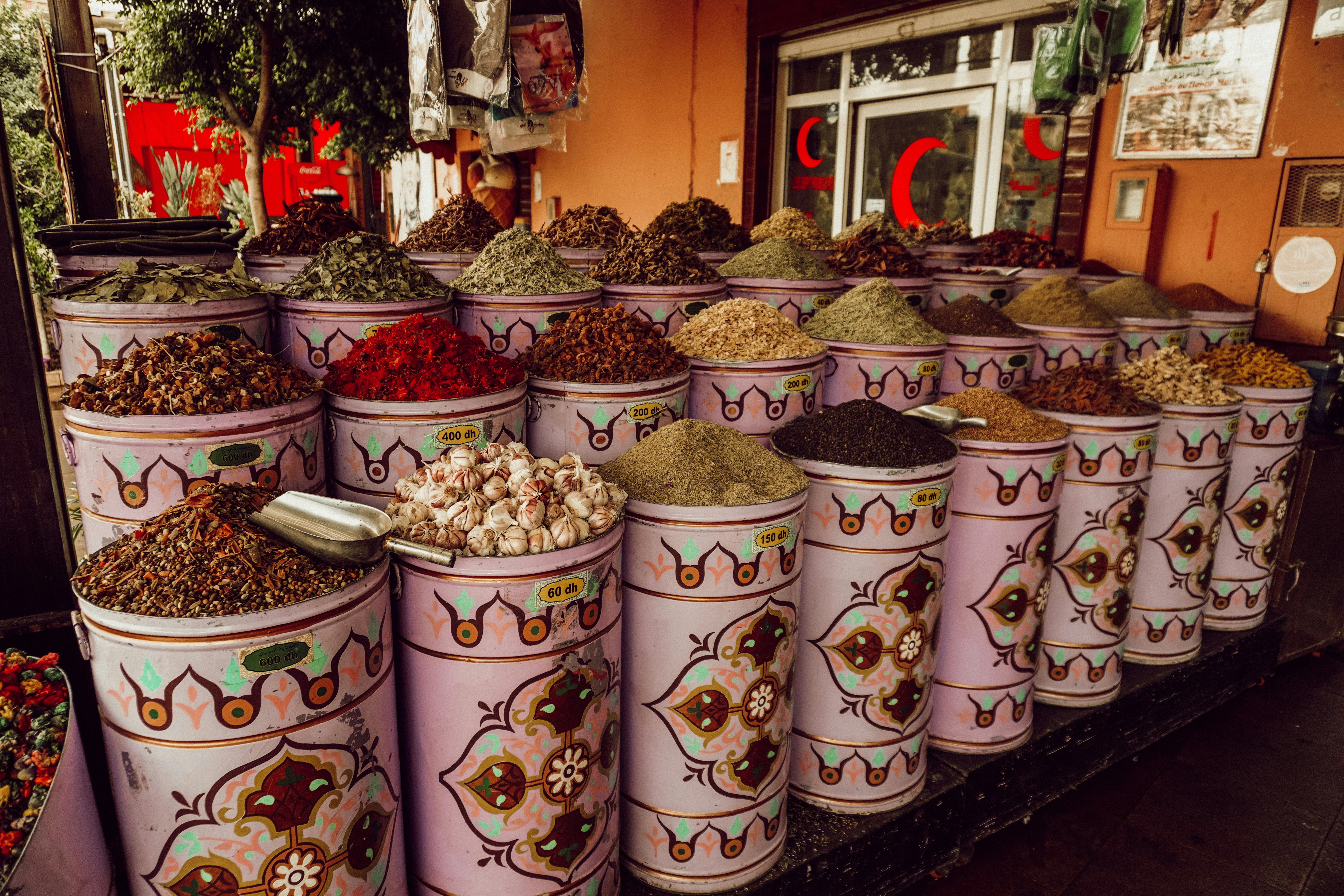 a large assortment of spices on display in a store