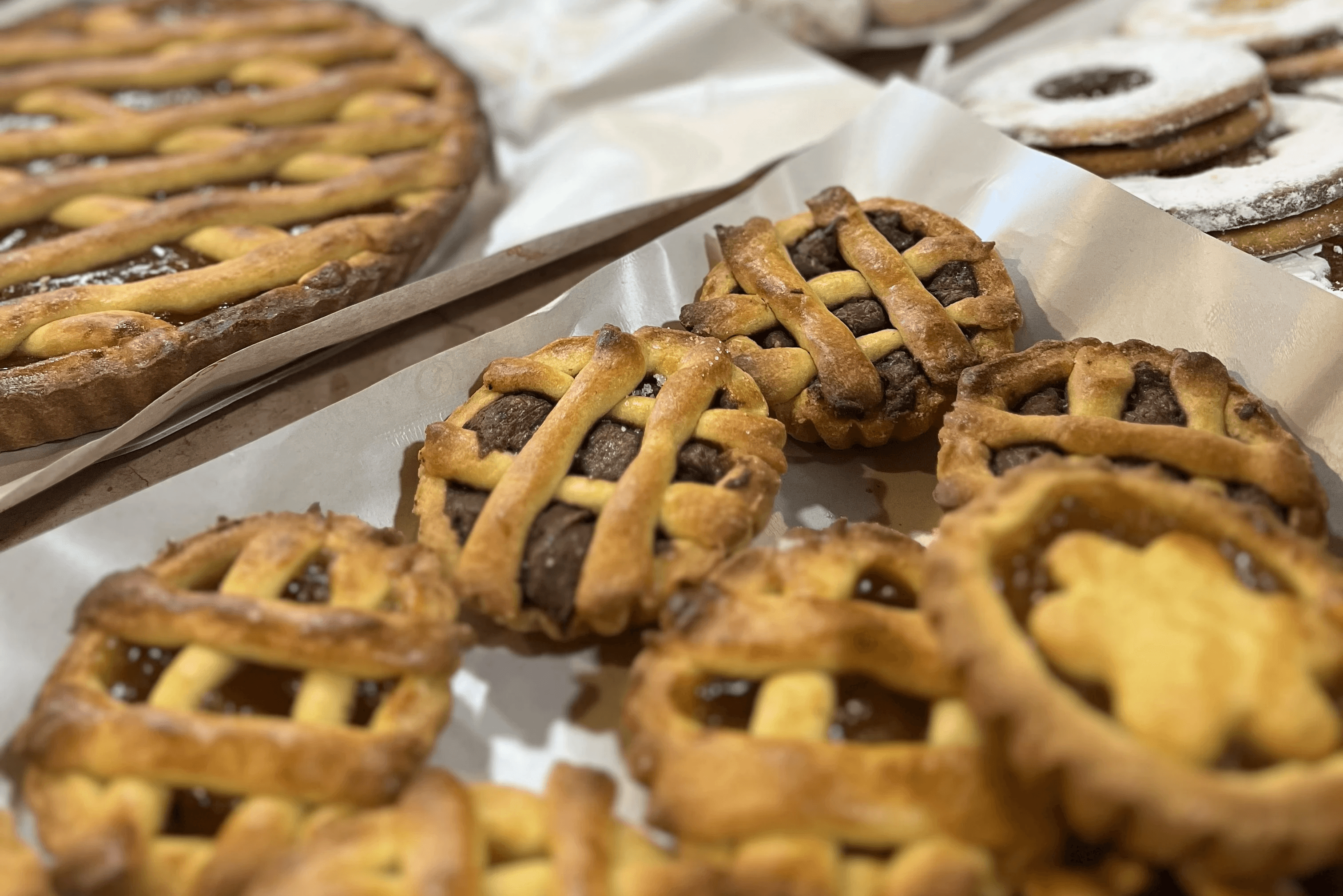 a display case filled with lots of different types of desserts