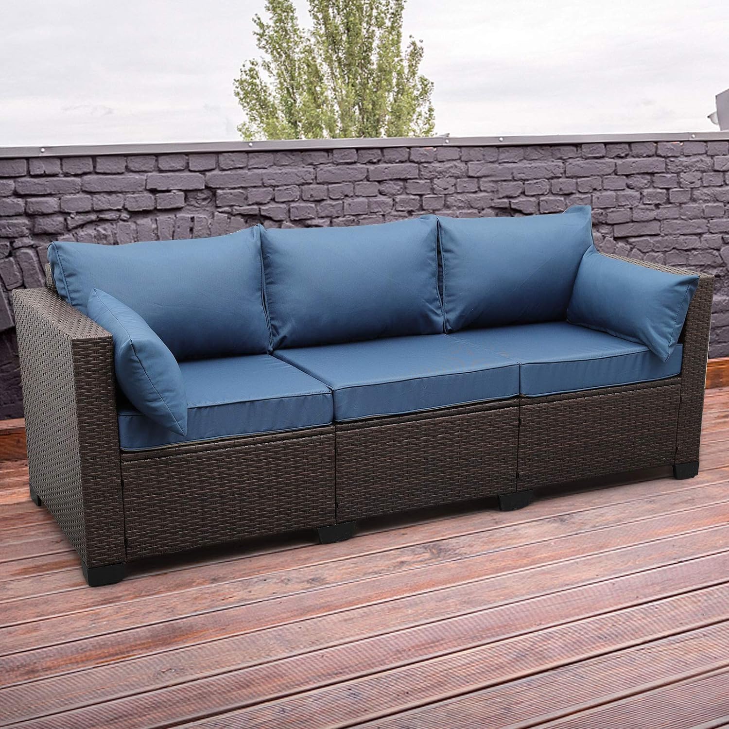 Stylish wicker sofa with soft seating and a classic woven look, perfect for a cozy and inviting atmosphere.