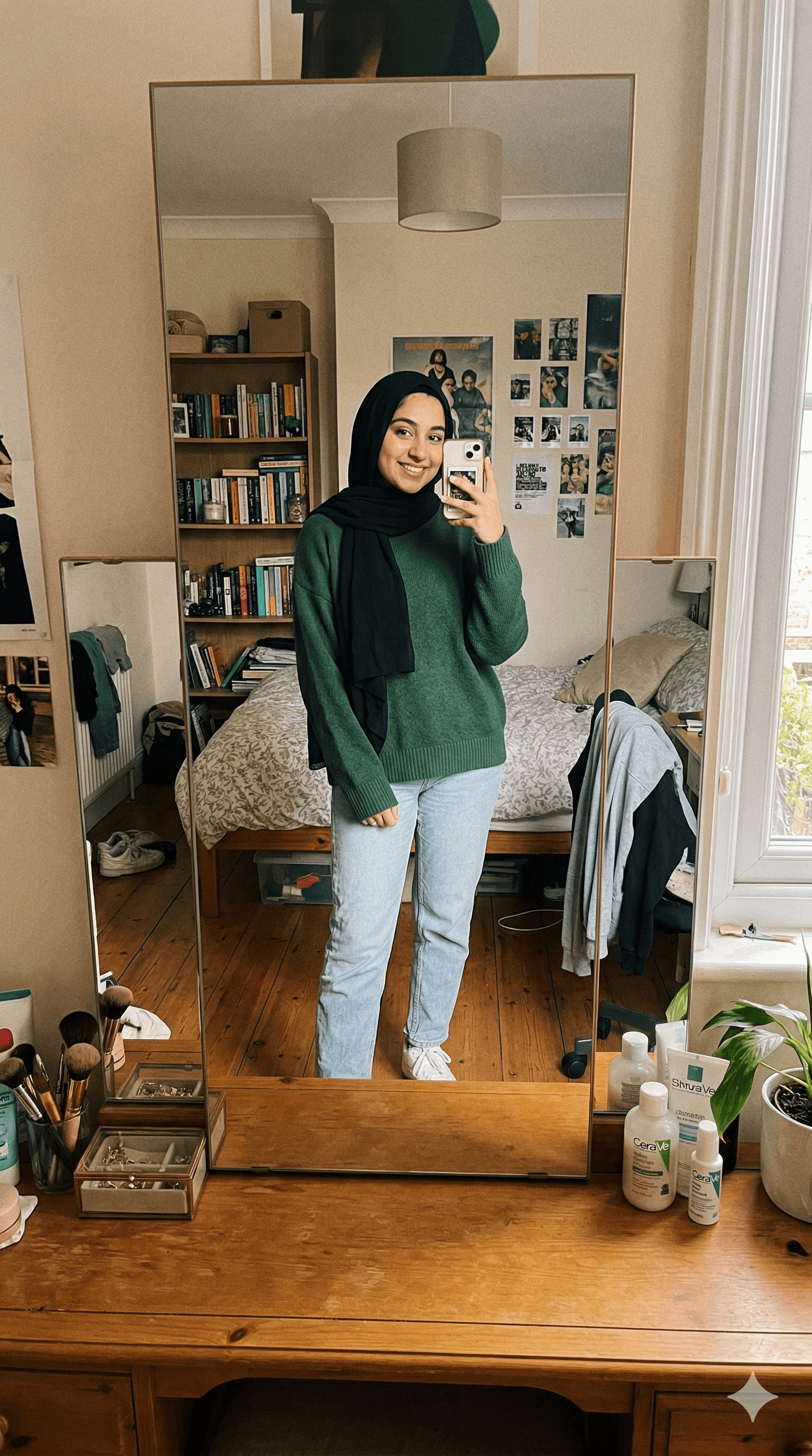 a man with a goatee smiles at the camera