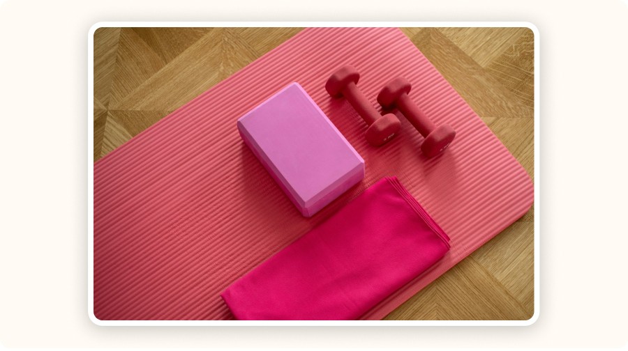 Yoga mat, dumbbells, and home workout gear