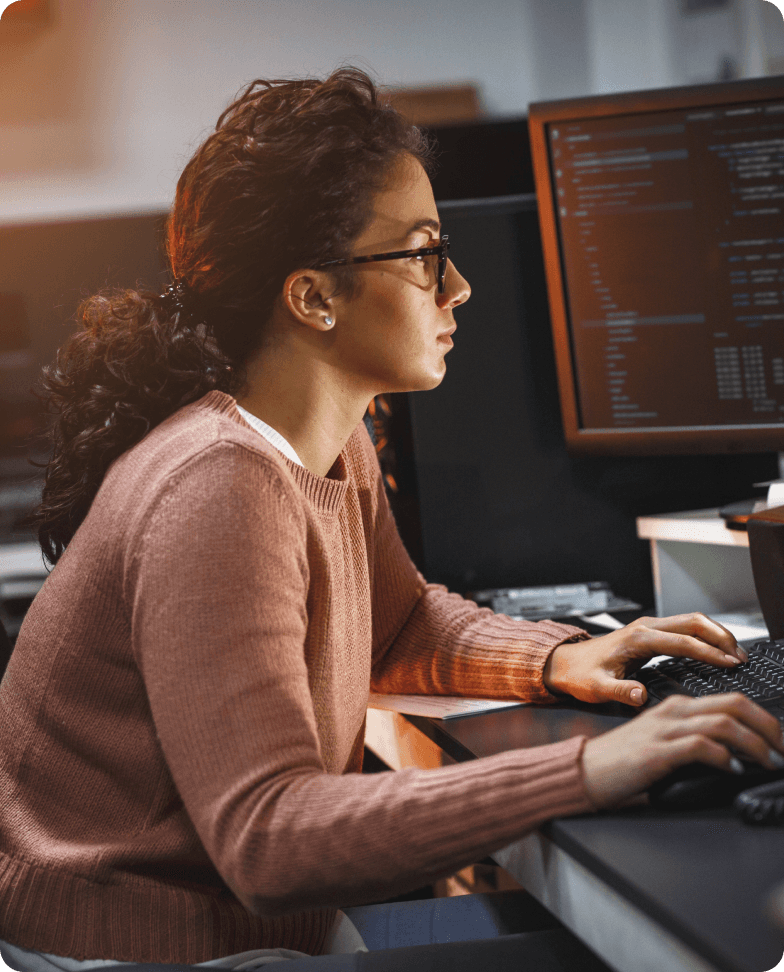 A young girl uses a tablet.