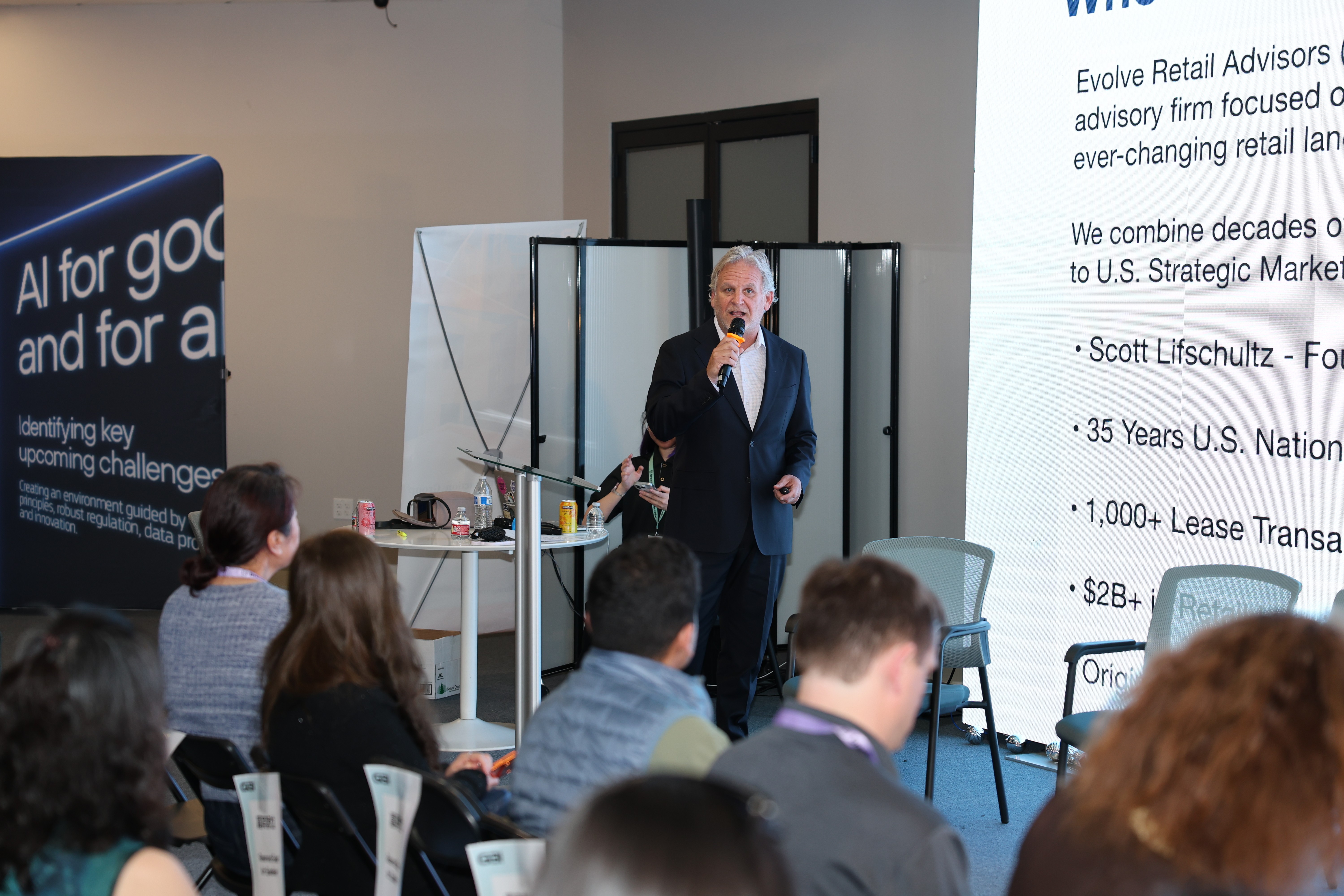 a little boy wearing a face mask and holding a box
