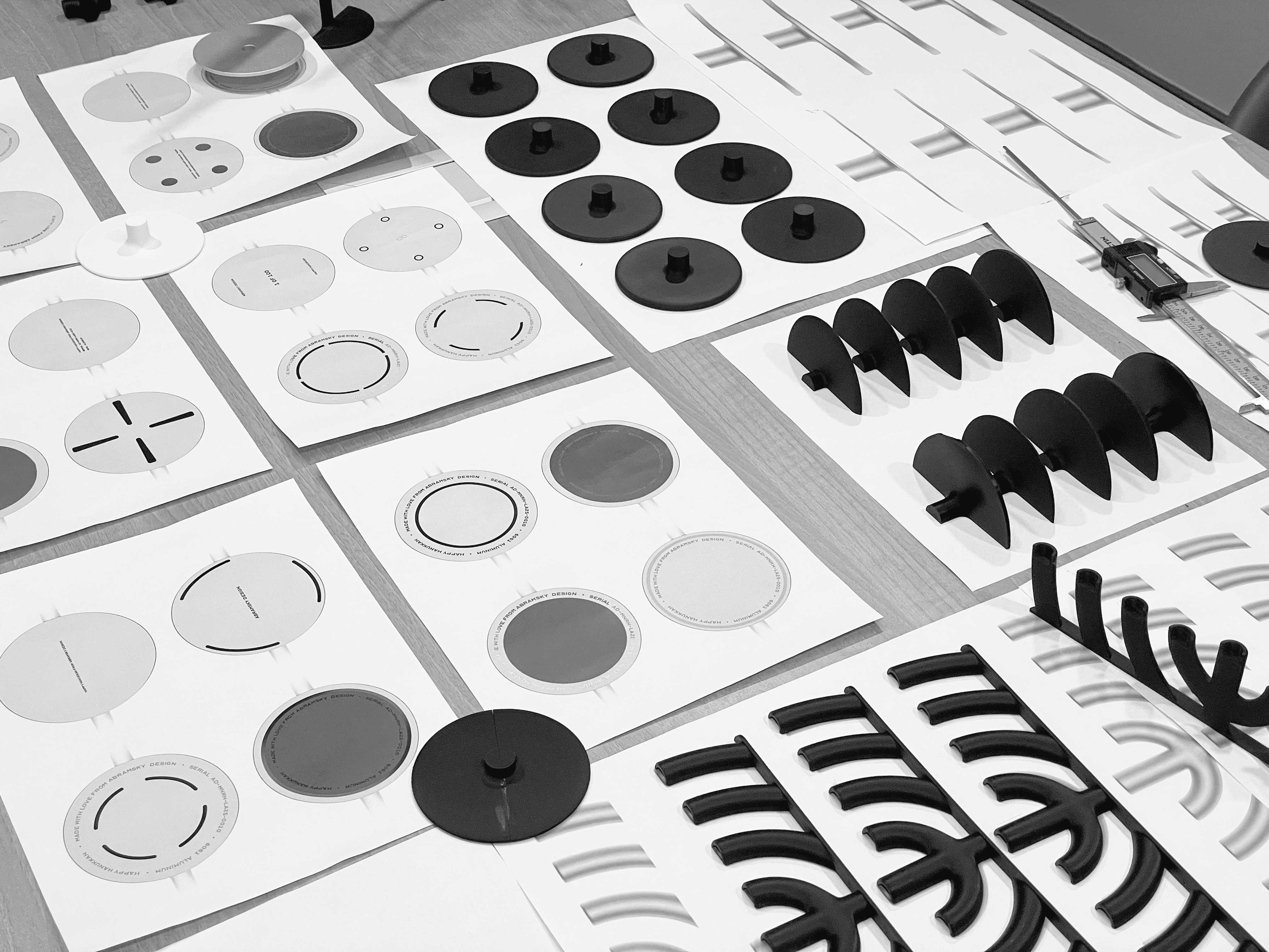 Batch.Works logo over a photo of a box of 3D printed objects