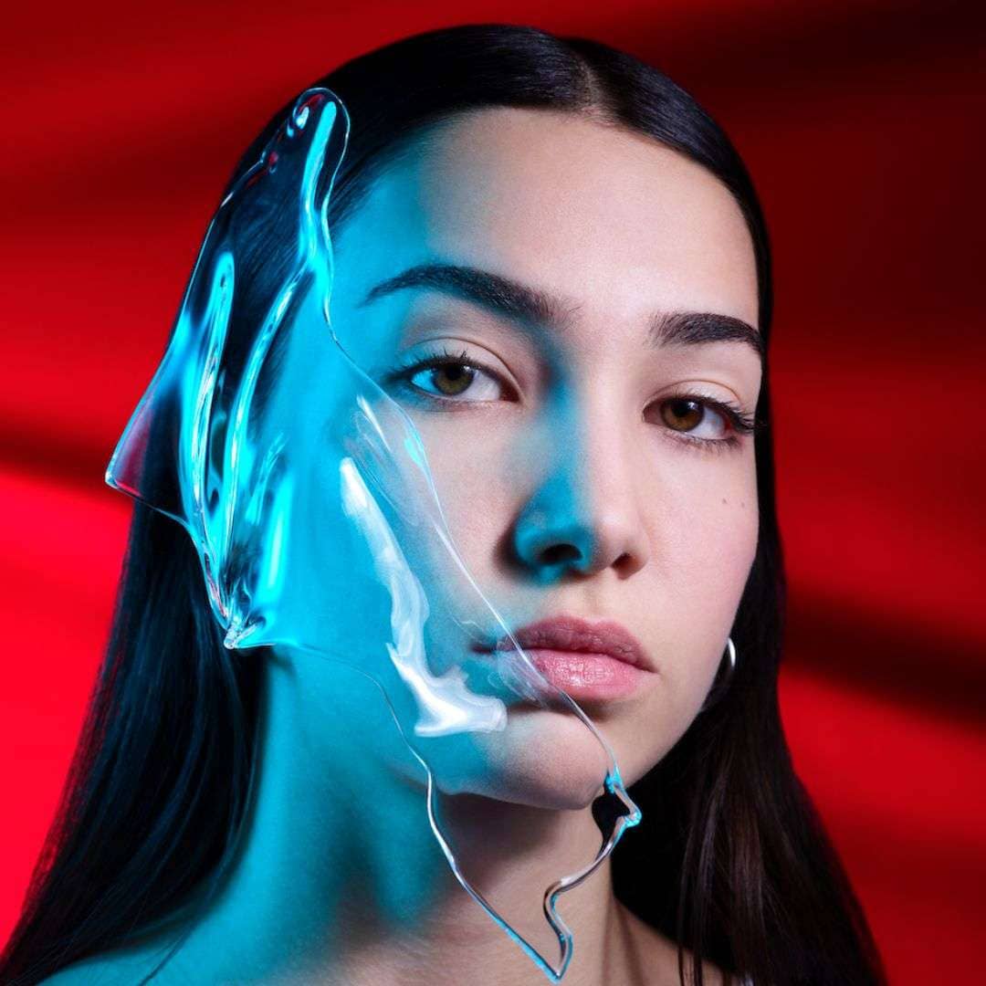 Beauty portrait with translucent cosmetic texture highlighting skincare innovation and I.D. Swiss Botanicals campaign identity
