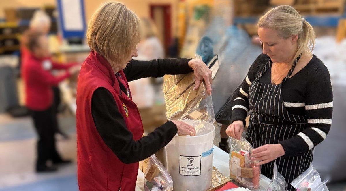 Volunteer making hygiene packages for seniors