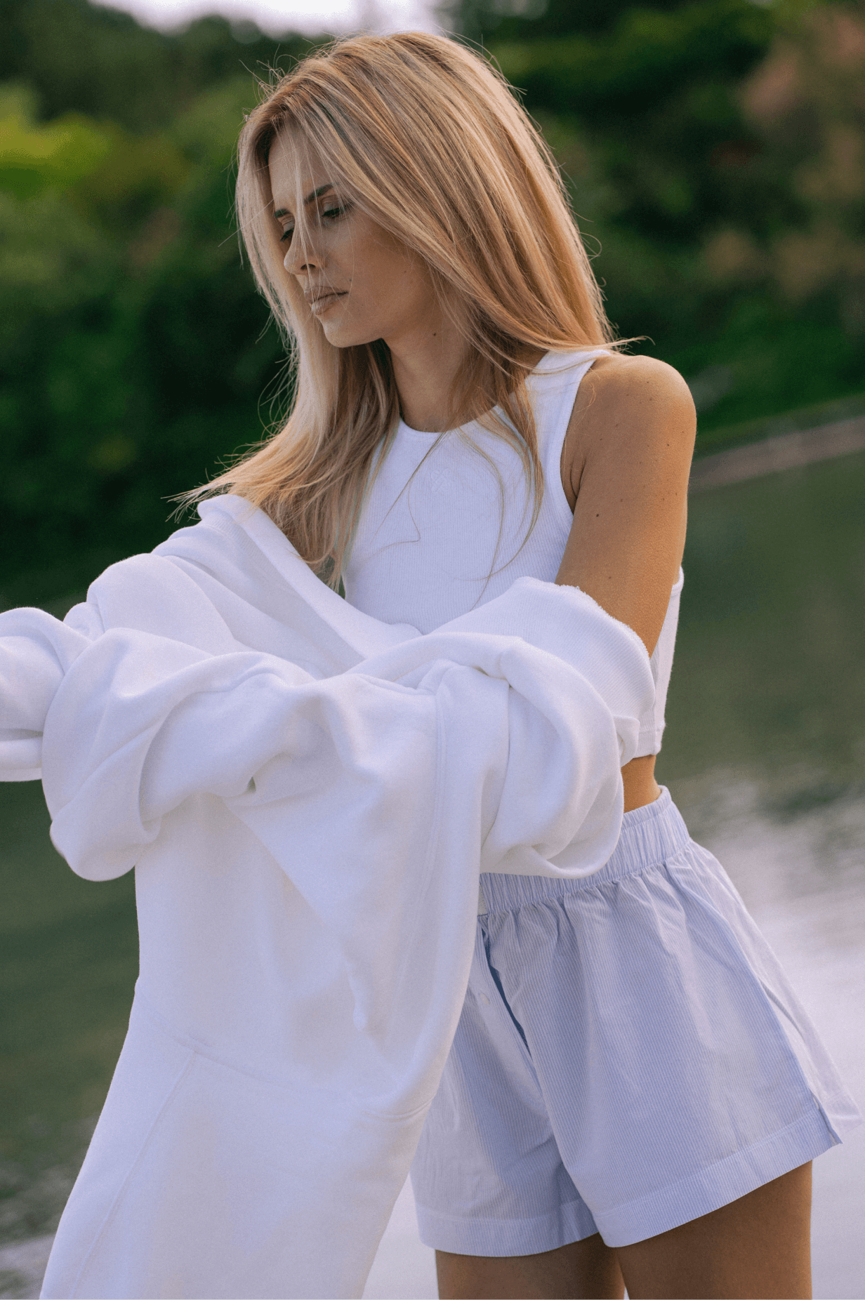 woman in white sleeveless shirt