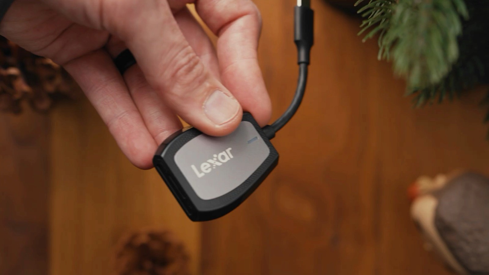 Lexar USB-C SD card reader held in hand