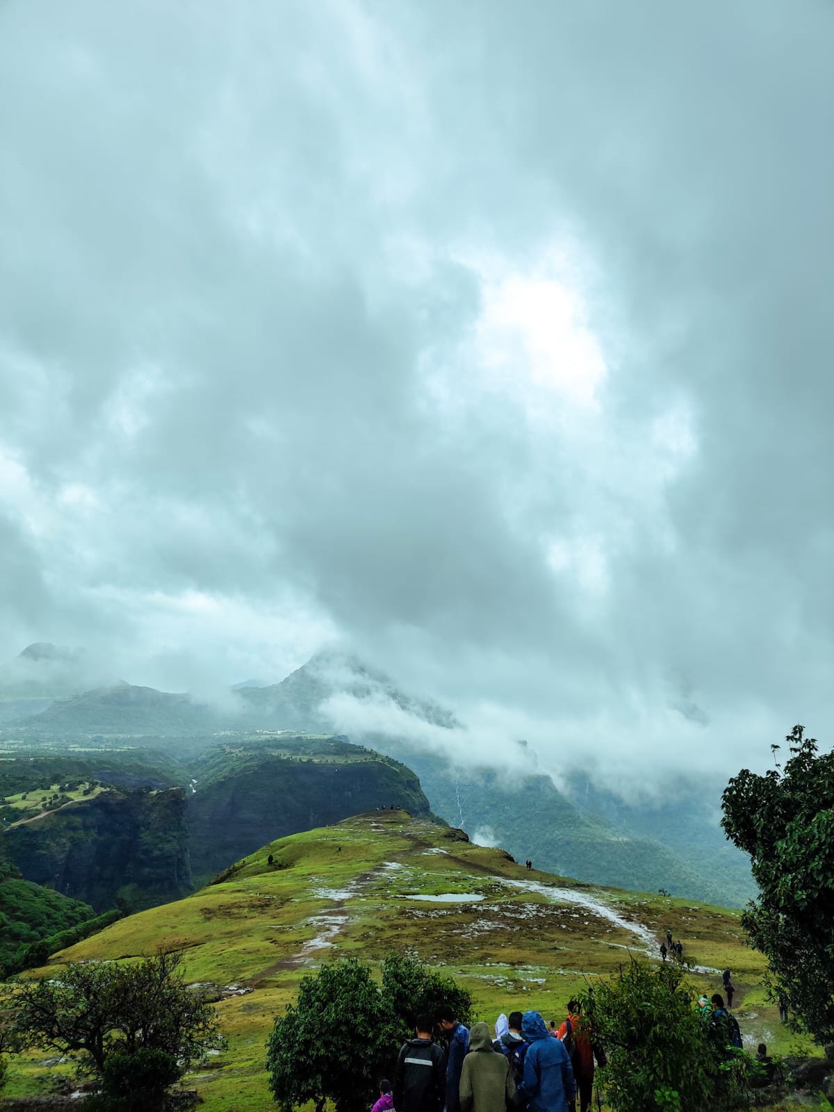 people in a large building with Tate Modern in the background