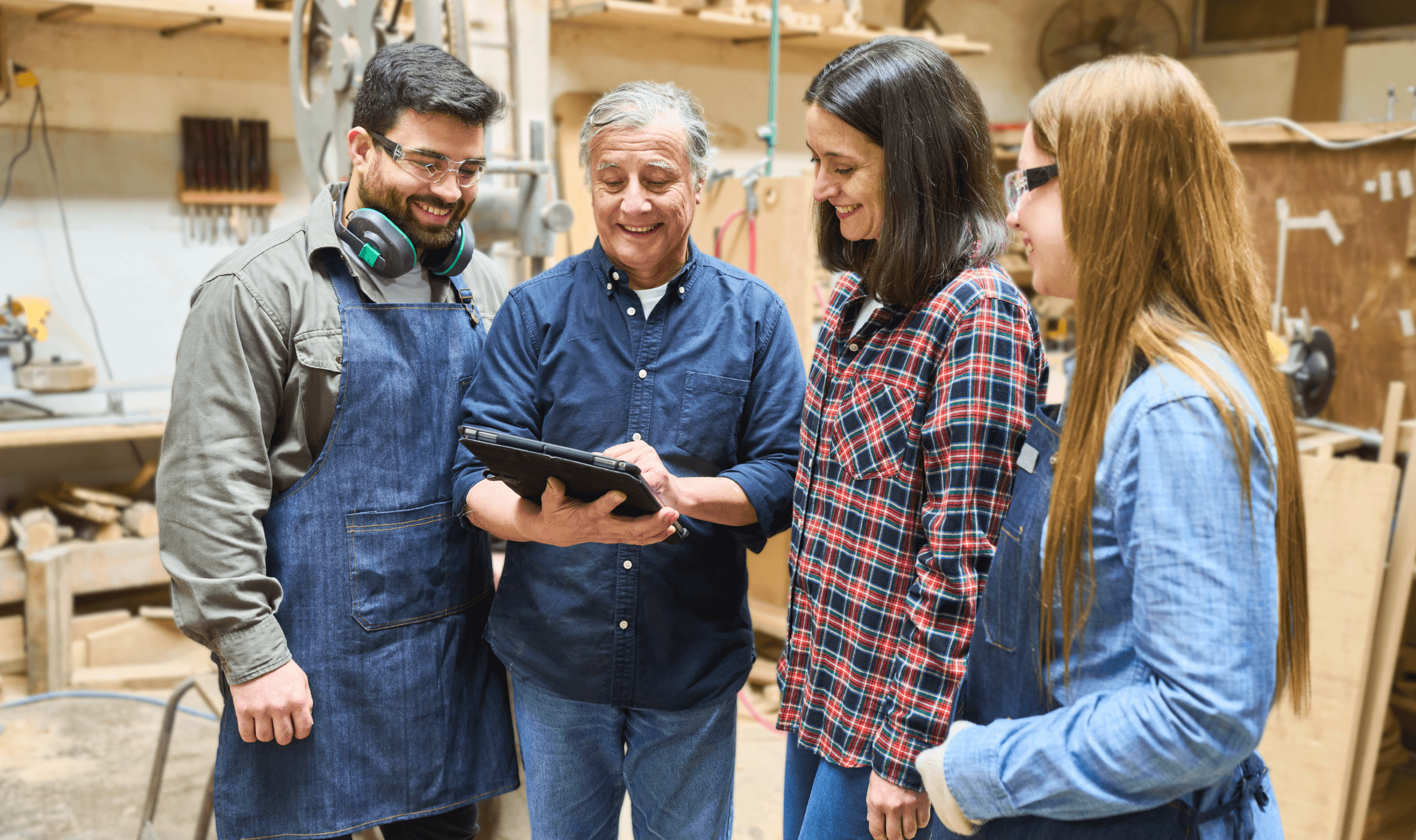 students attending a diy training course surround the tutor with questions