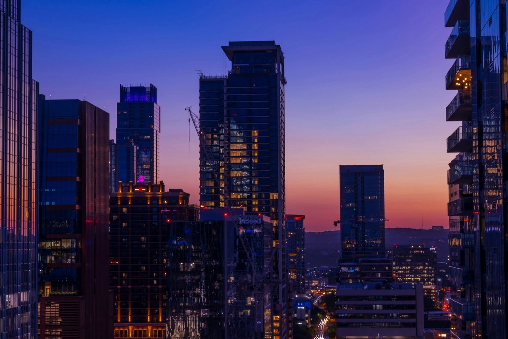 a city skyline at sunset